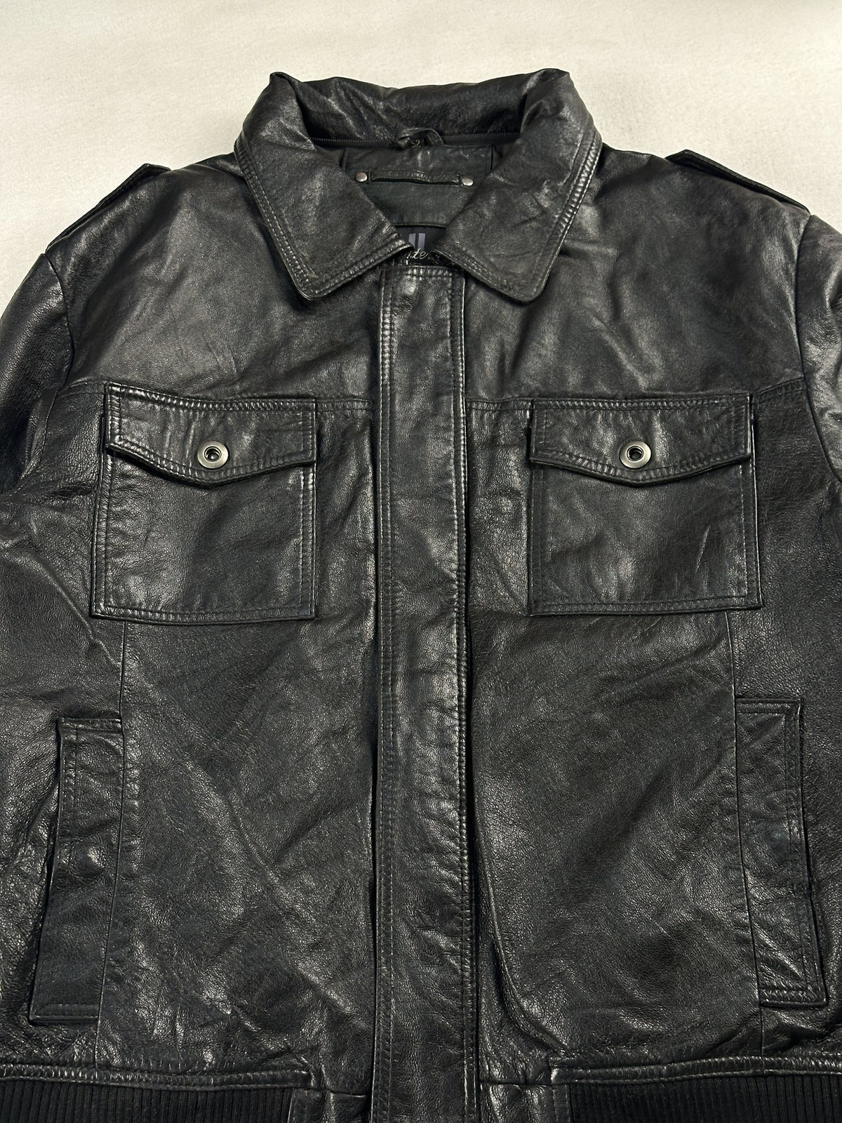 Black leather bomber jacket, size M - back view.