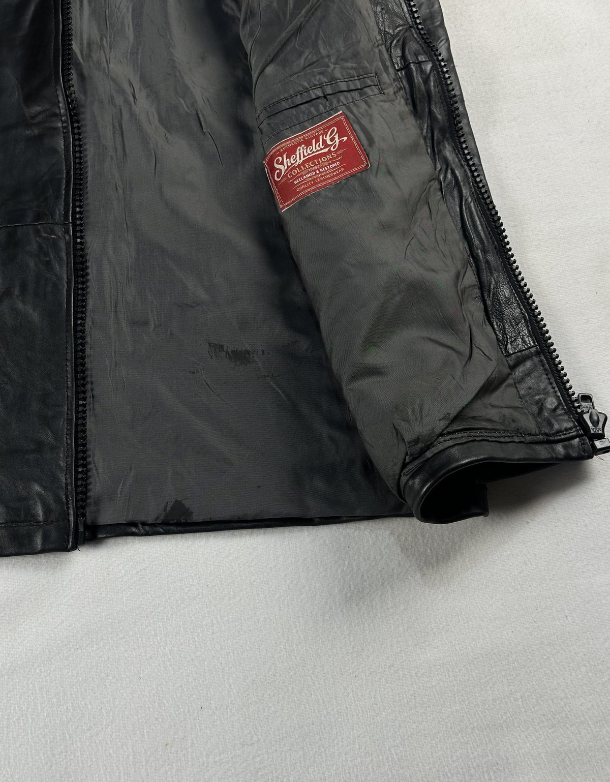 Black leather cafe racer jacket, size M - interior lining.