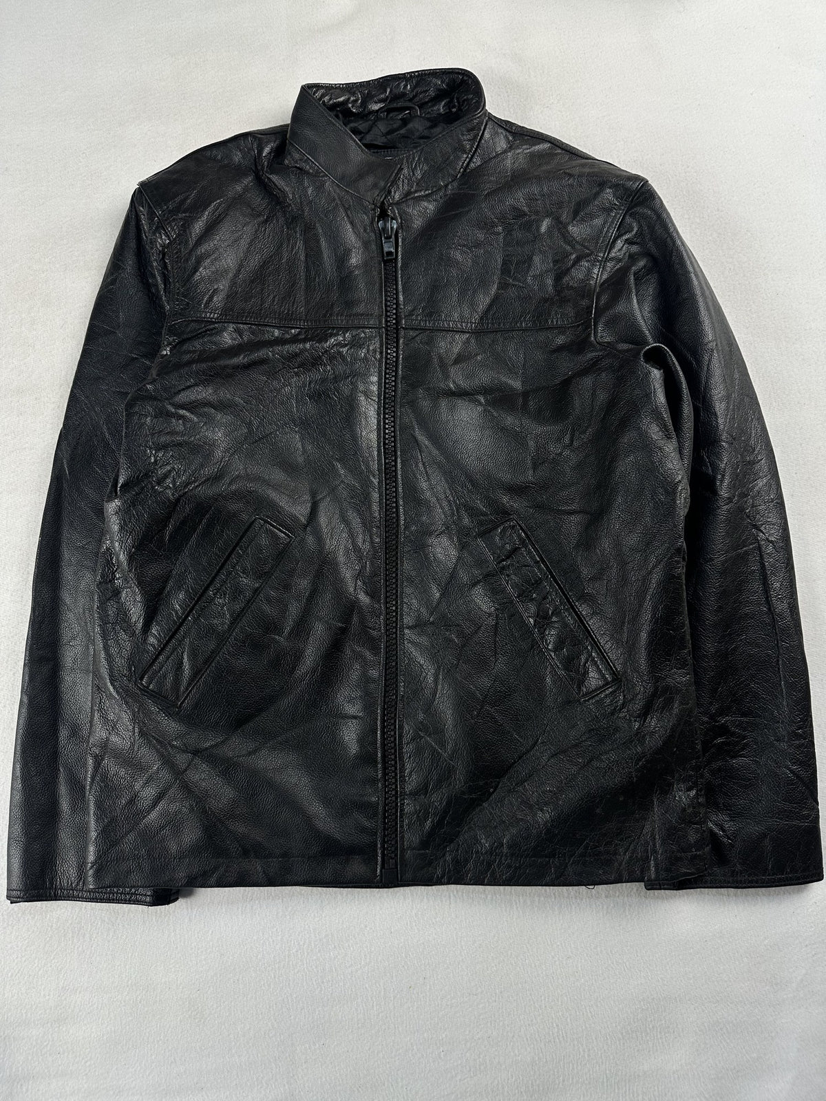 Black leather vintage jacket, size M - chest and pocket detail.