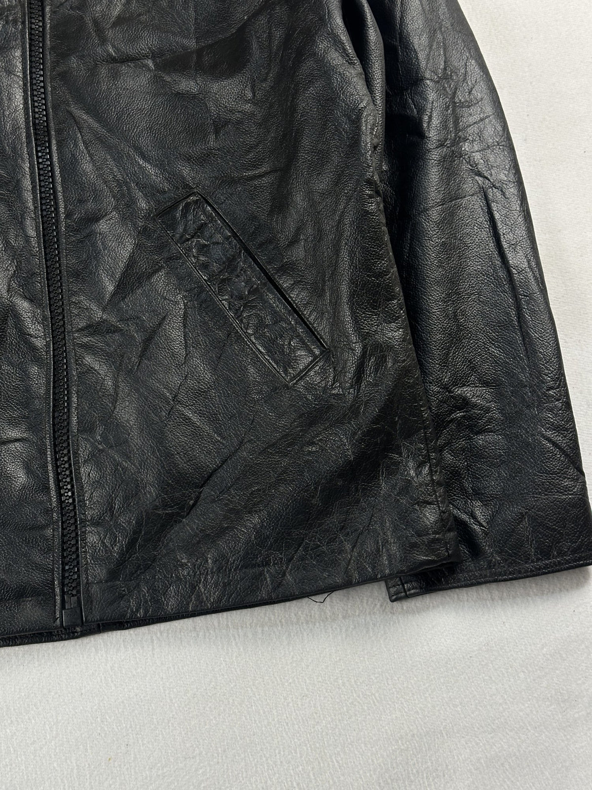 Black leather vintage jacket, size M - size and label context.