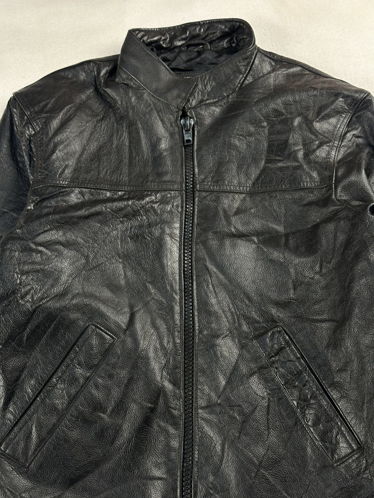 Black leather vintage jacket, size M - back view.