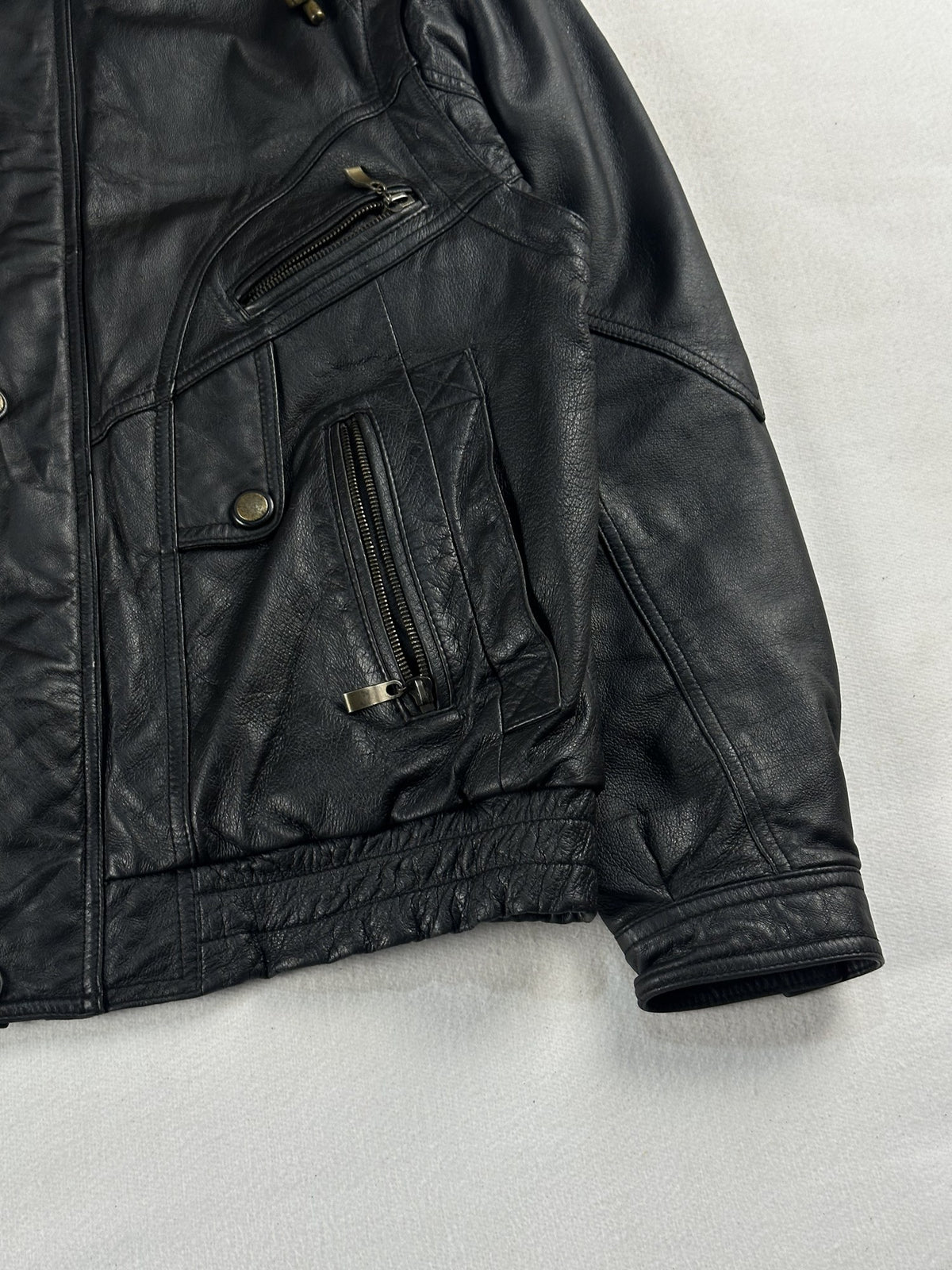 Black leather vintage jacket, size M - size and label context.