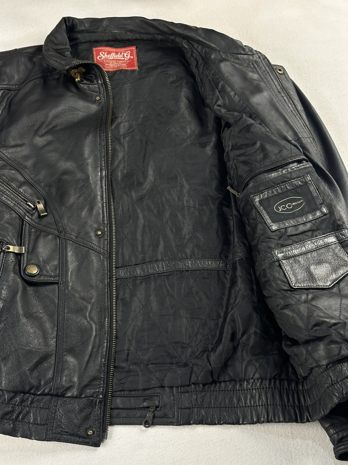 Black leather vintage jacket, size M - interior lining.