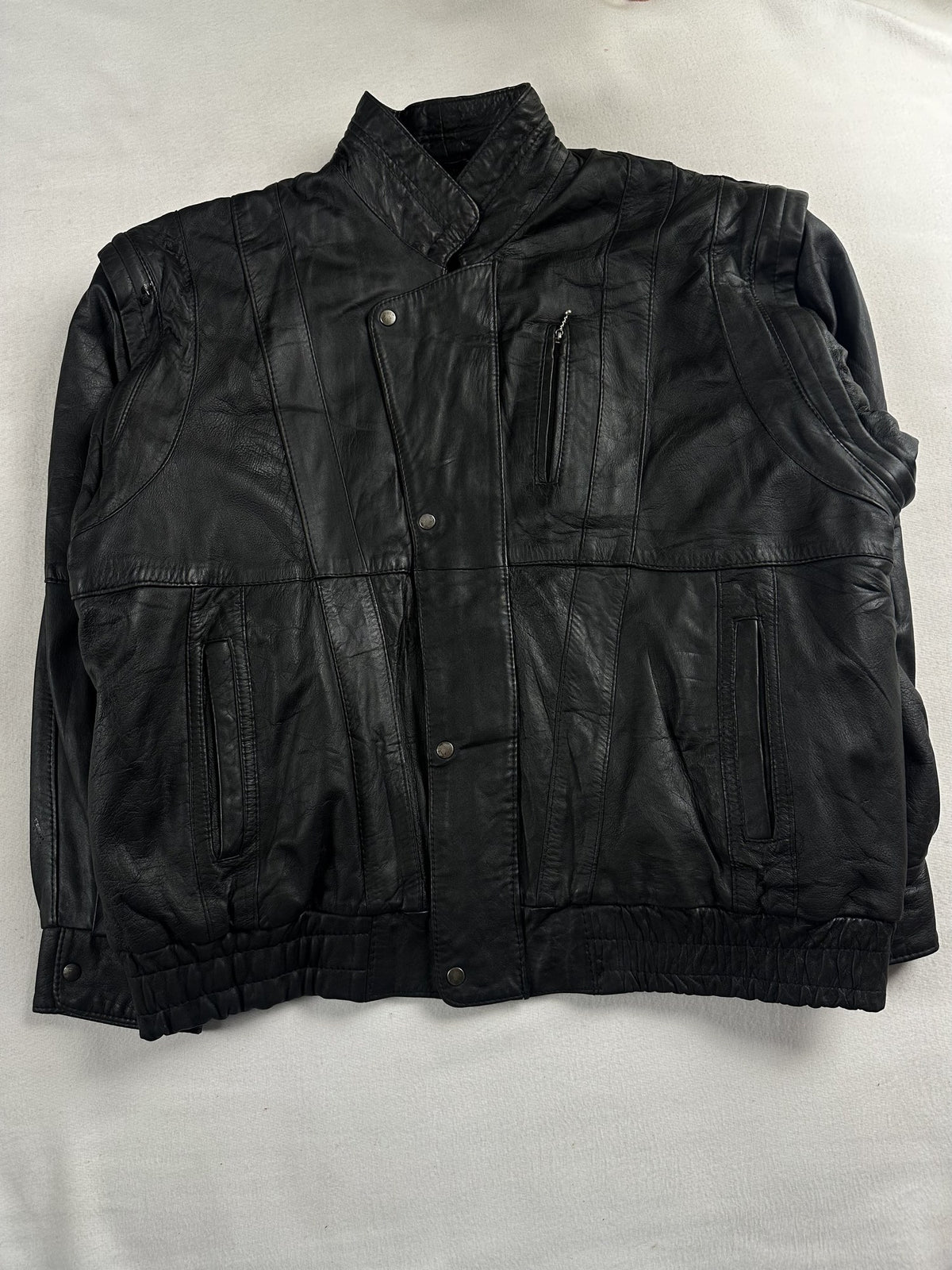 Black leather vintage jacket, size M - chest and pocket detail.