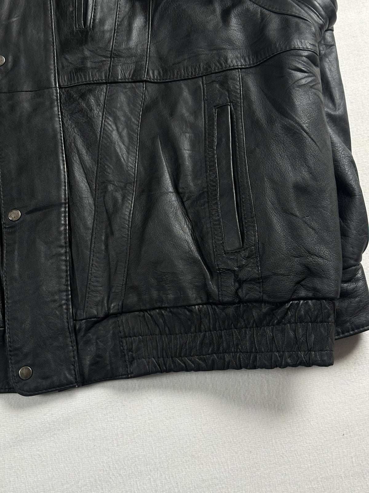 Black leather vintage jacket, size M - size and label context.