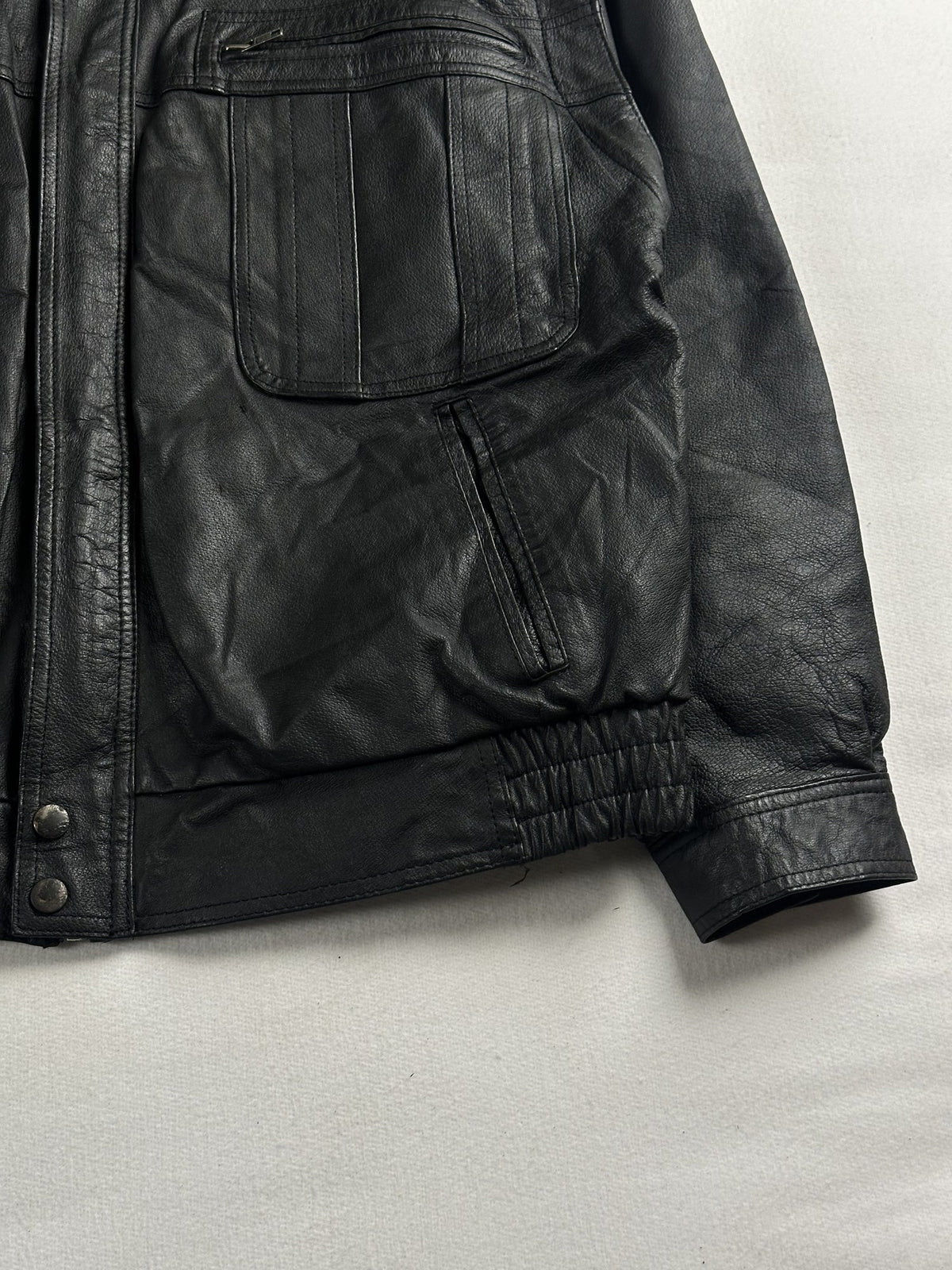 Black leather vintage jacket, size M - size and label context.