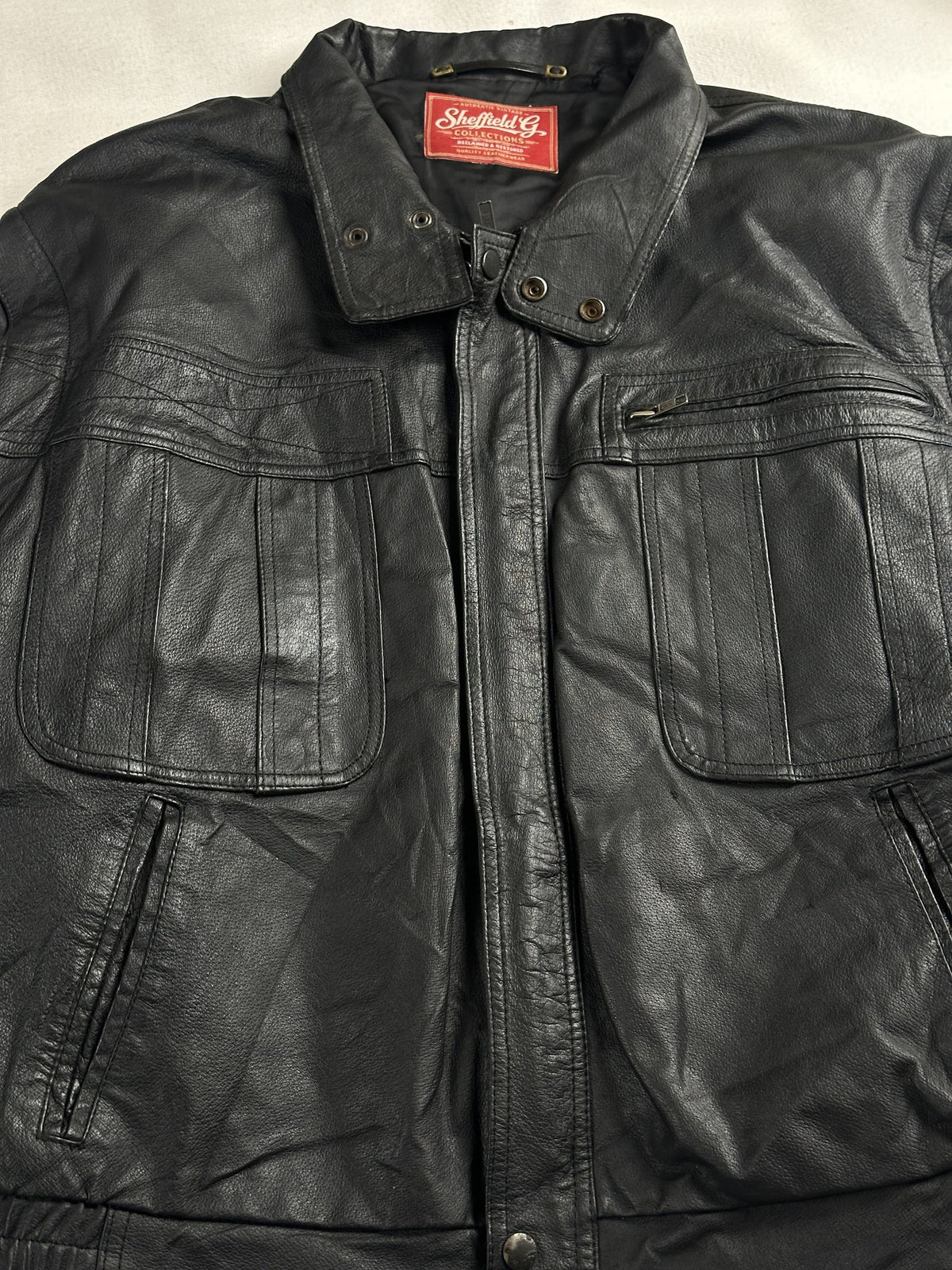 Black leather vintage jacket, size M - back view.