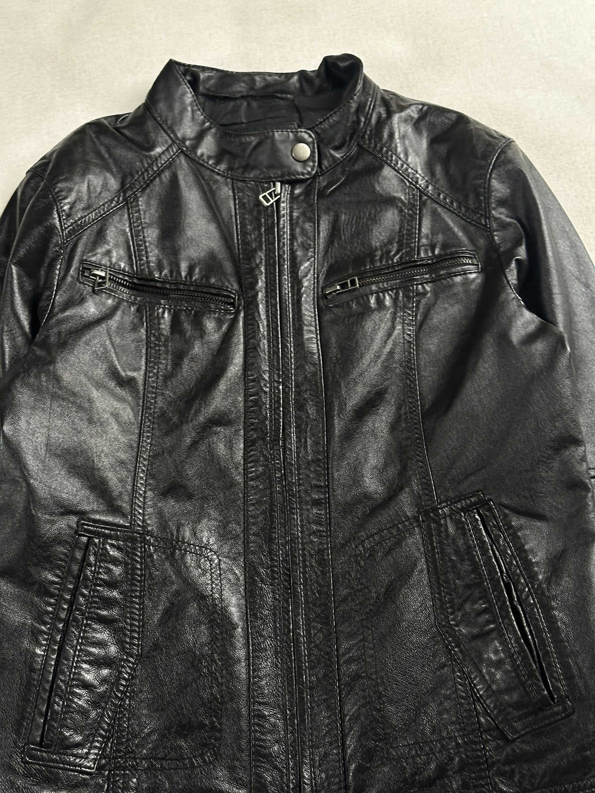 Black leather cafe racer jacket, size XS - back view.