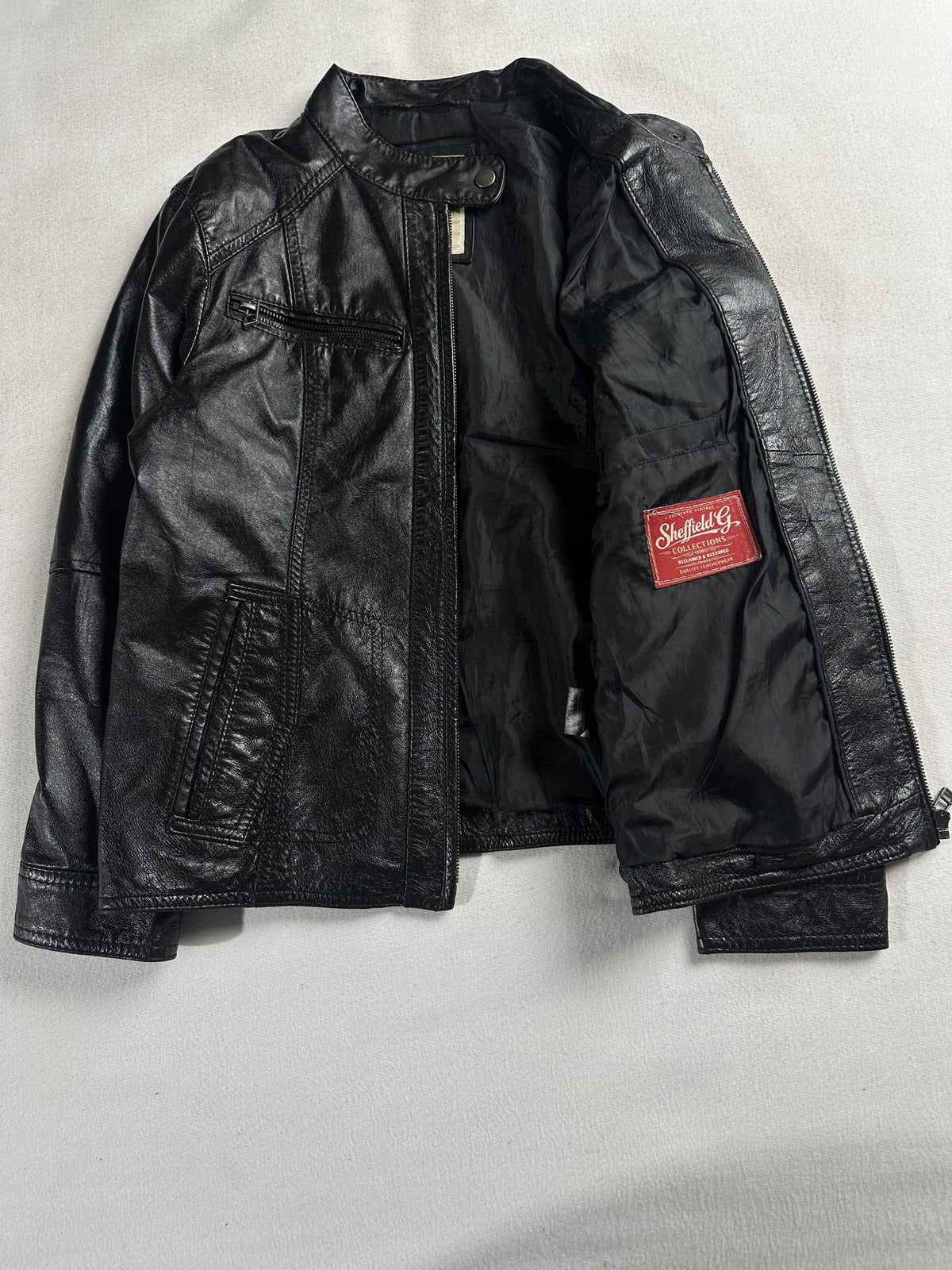 Black leather cafe racer jacket, size XS - interior lining.