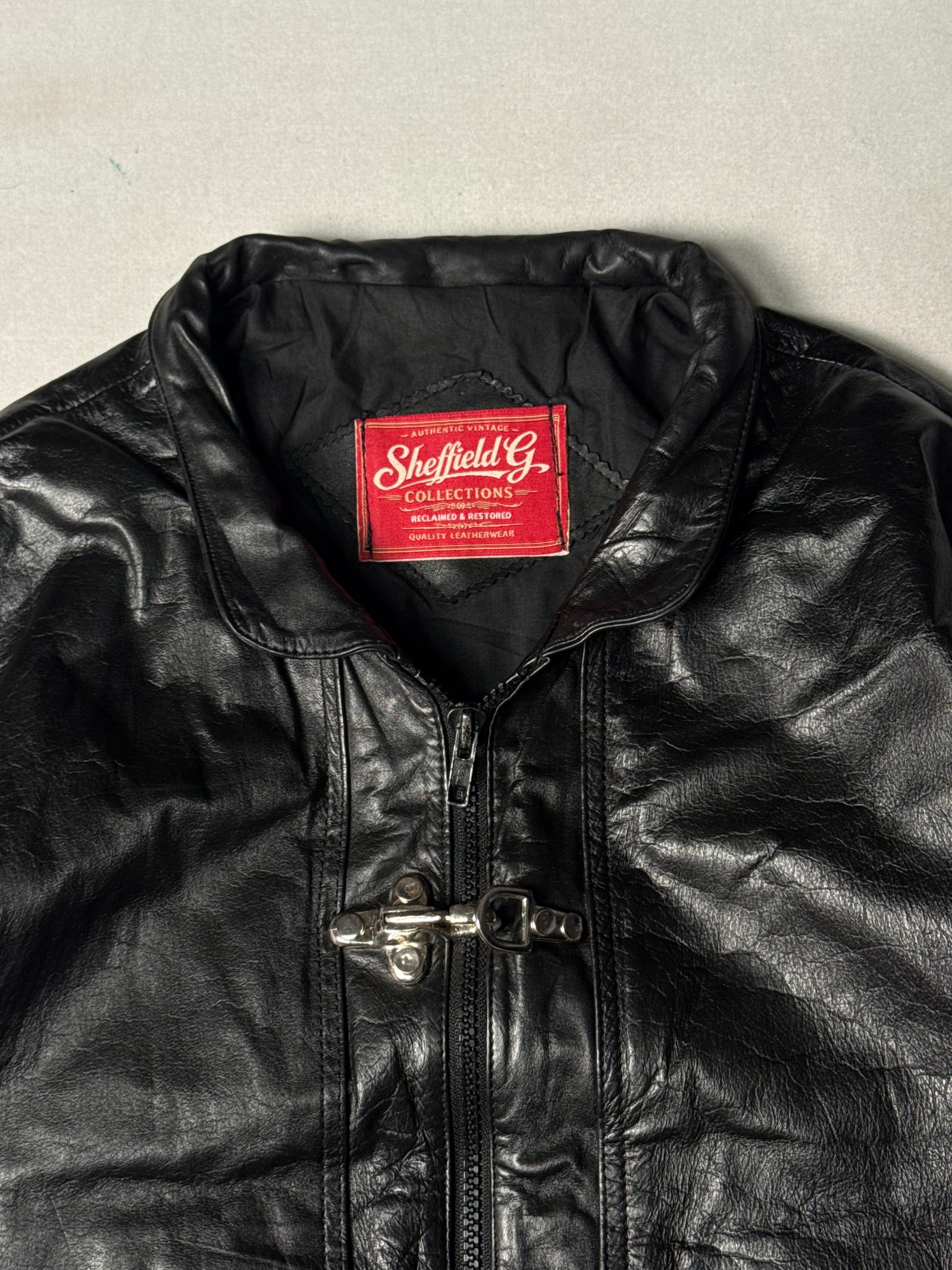 Black Real Leather Clasp Jacket (Size L)
