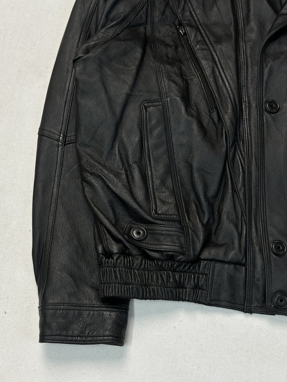 Chest detail of the size L black leather vintage jacket with a 25 inch chest.