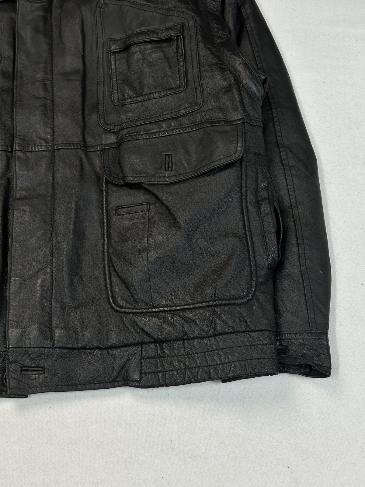 Collar and top yoke of the black leather field jacket.