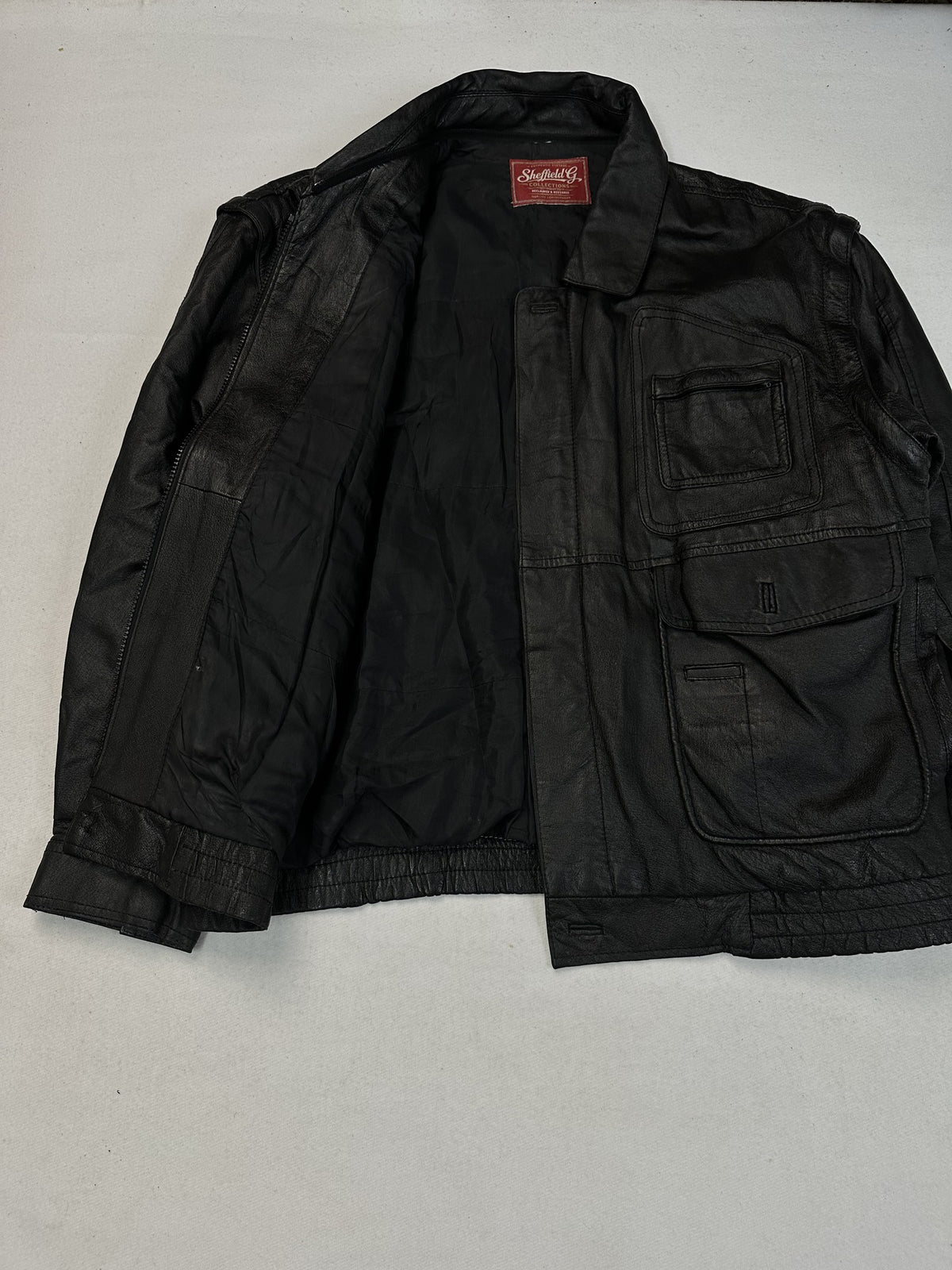 Back of the black leather field jacket, size L.