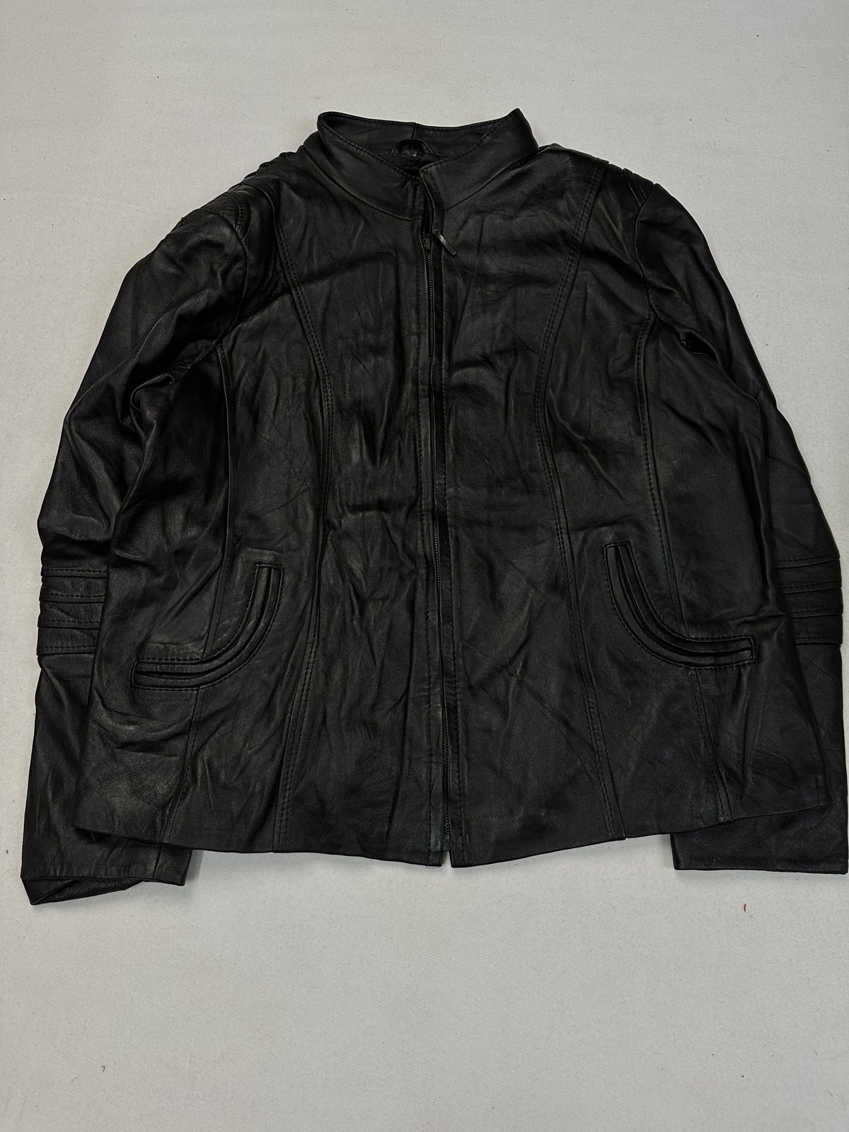 Front panel of the black leather cafe racer jacket, size M.