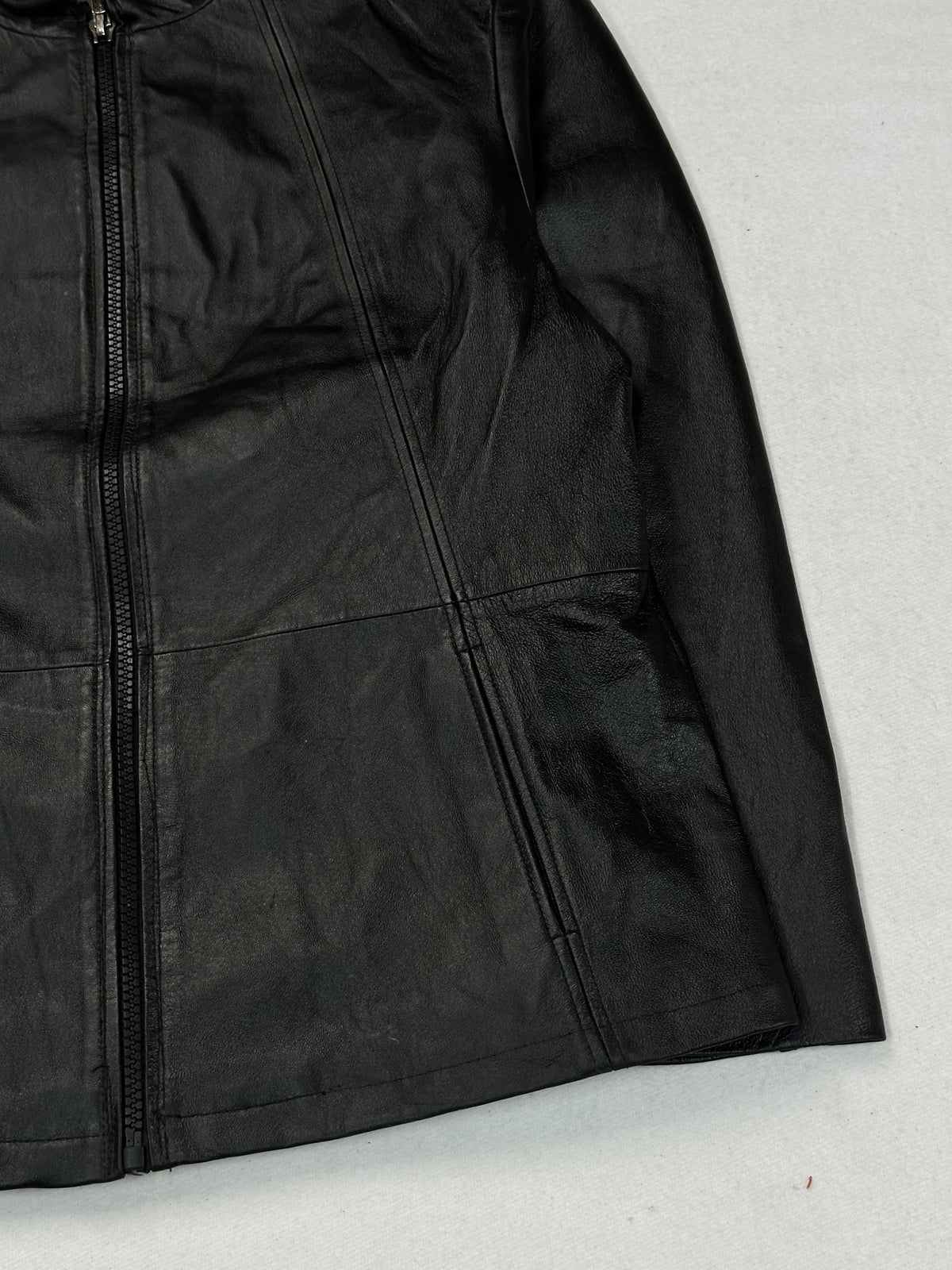 Black leather cafe racer jacket, size L - size and label context.