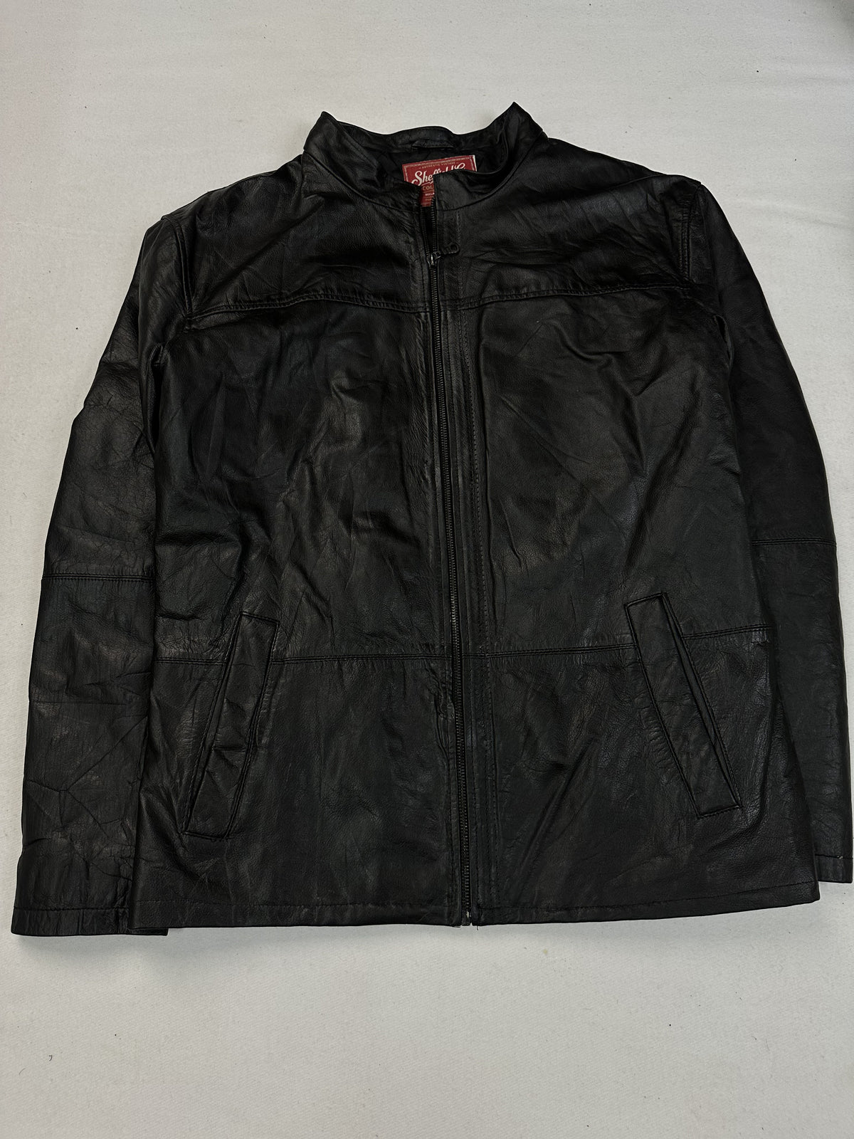 Black leather vintage jacket, size L - chest and pocket detail.