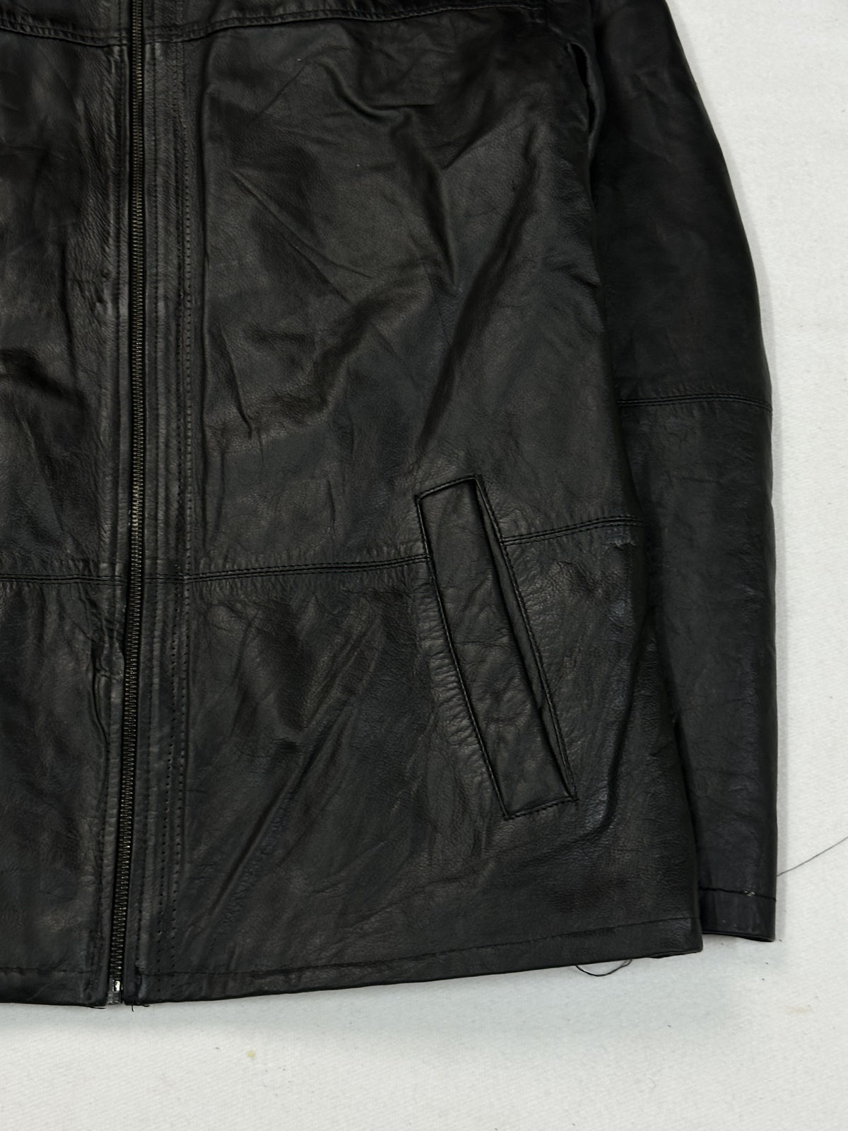 Black leather vintage jacket, size L - size and label context.
