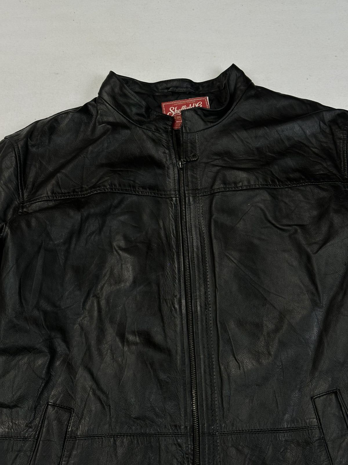 Black leather vintage jacket, size L - back view.