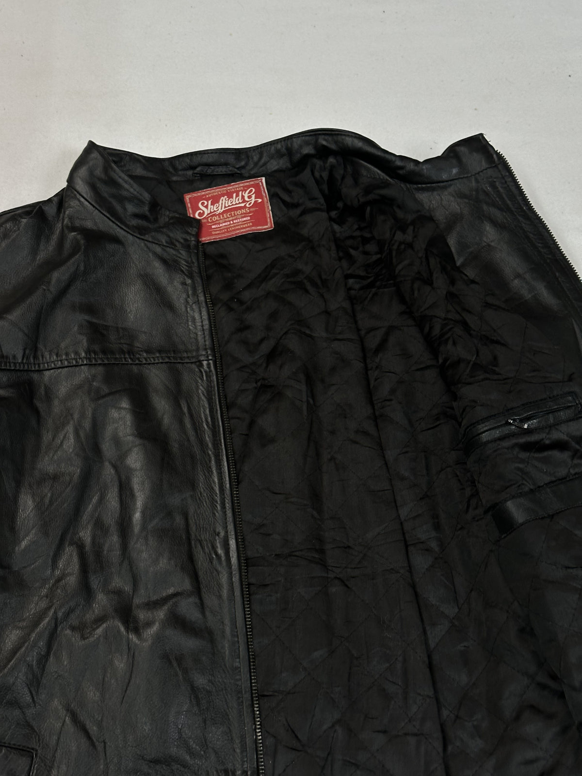 Black leather vintage jacket, size L - interior lining.