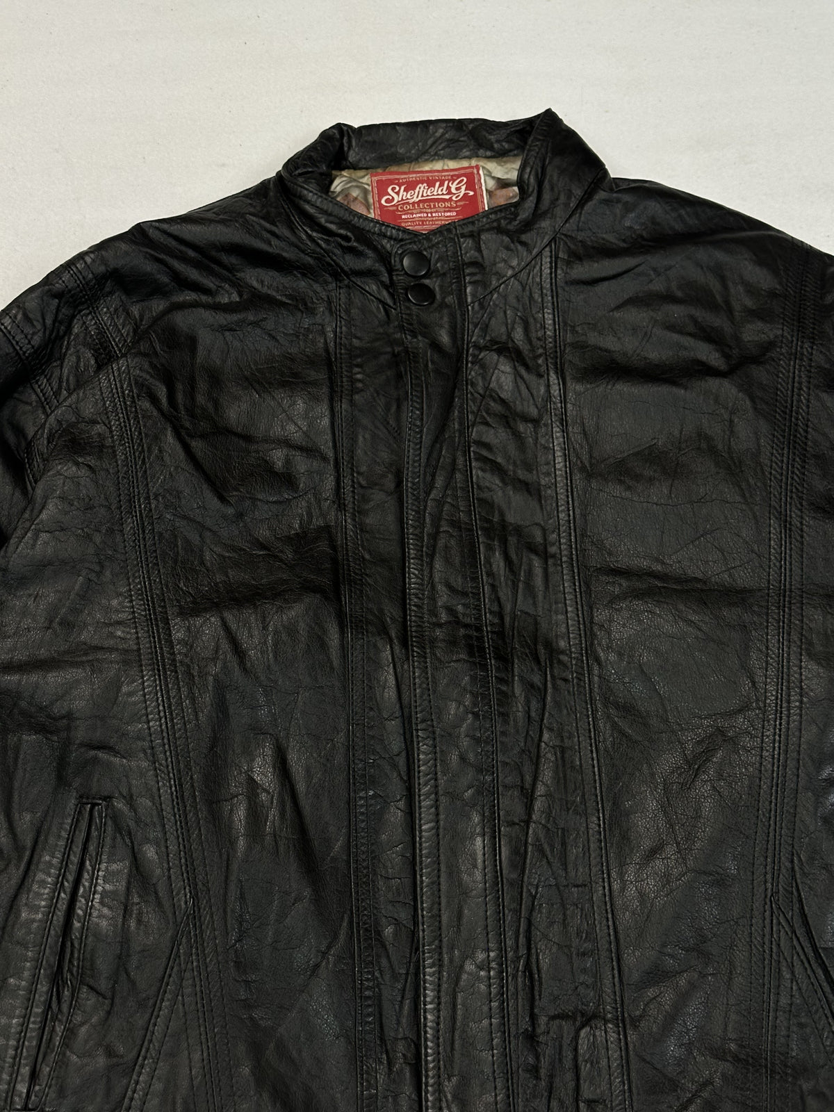 Black leather vintage jacket, size L - back view.