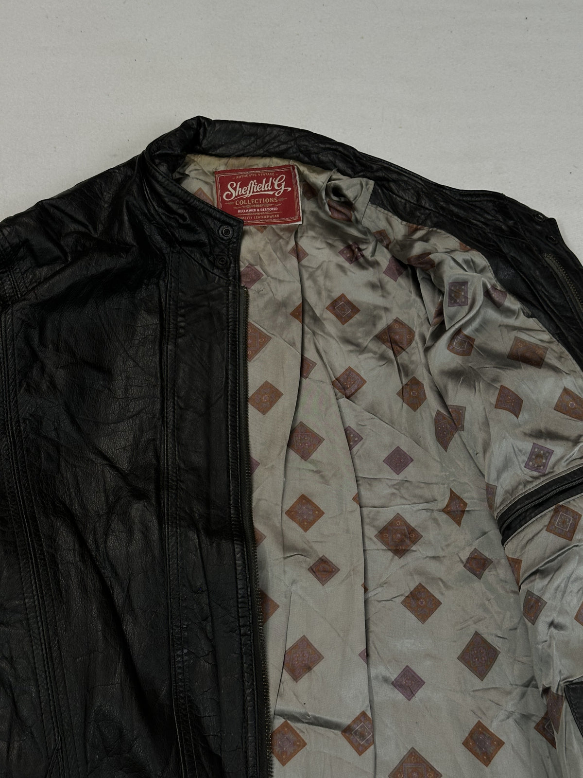 Black leather vintage jacket, size L - interior lining.