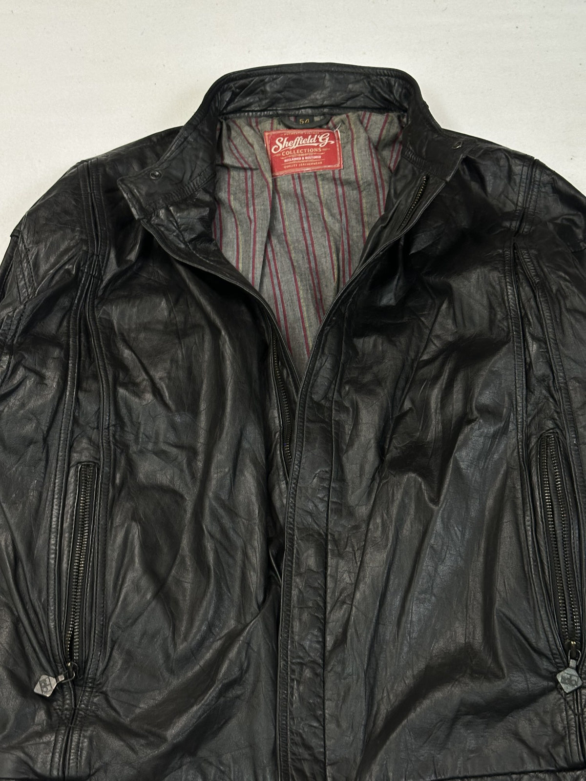 Black leather cafe racer jacket, size L - interior lining.