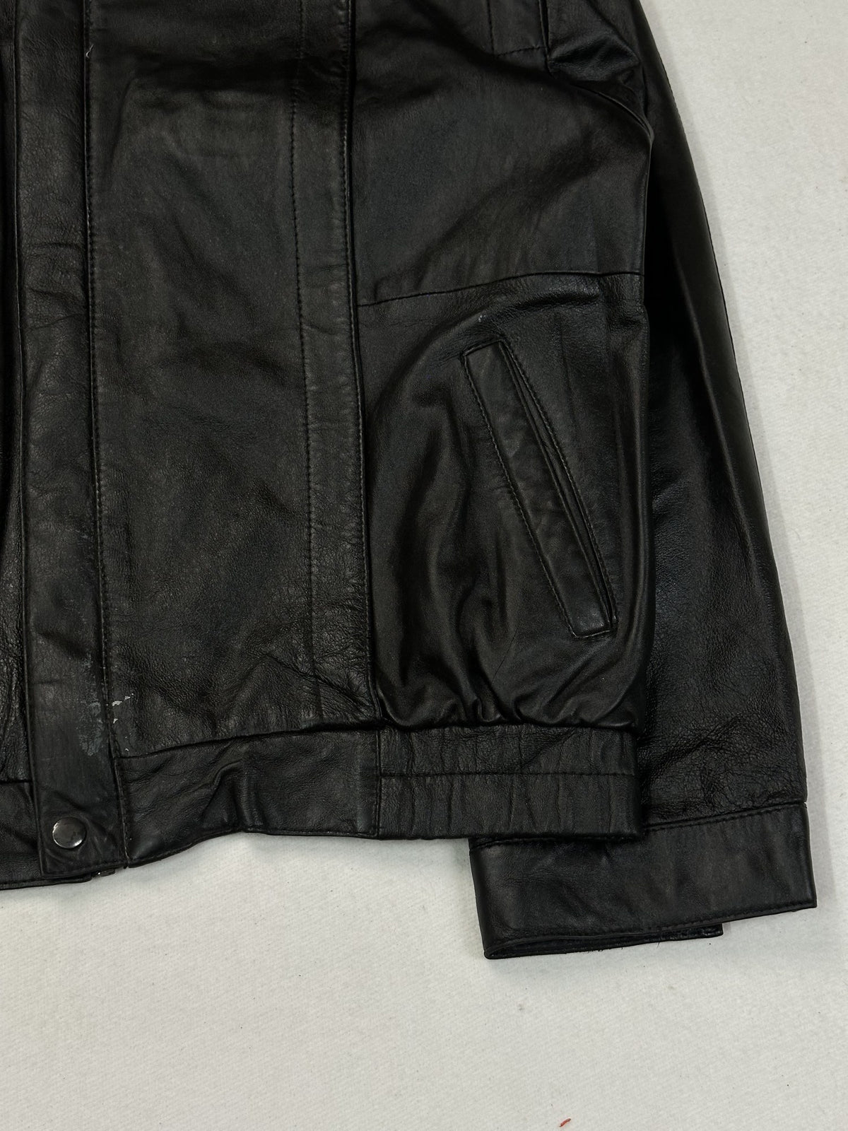 Black leather vintage jacket, size M - size and label context.