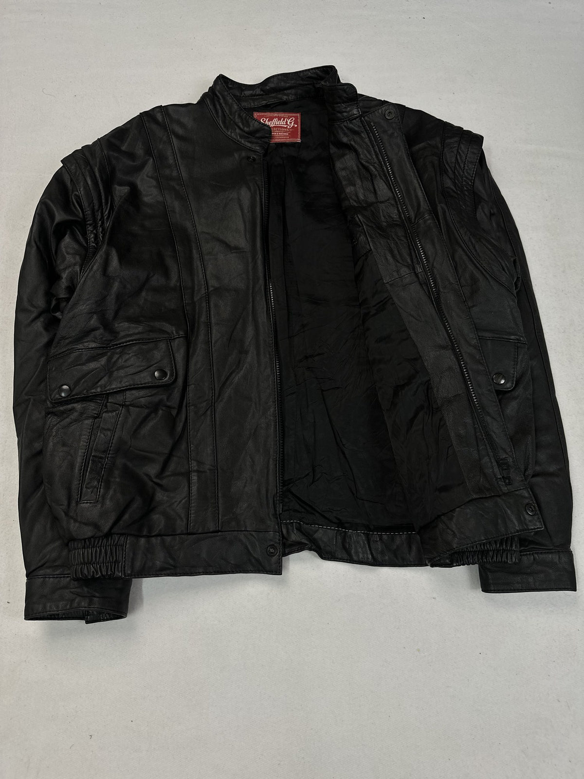 Black leather vintage jacket, size L - interior lining.