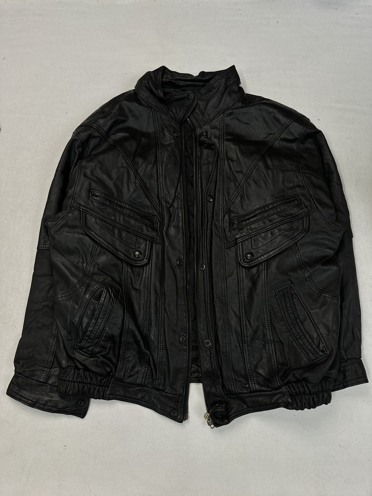 Black leather field jacket, size L - chest and pocket detail.