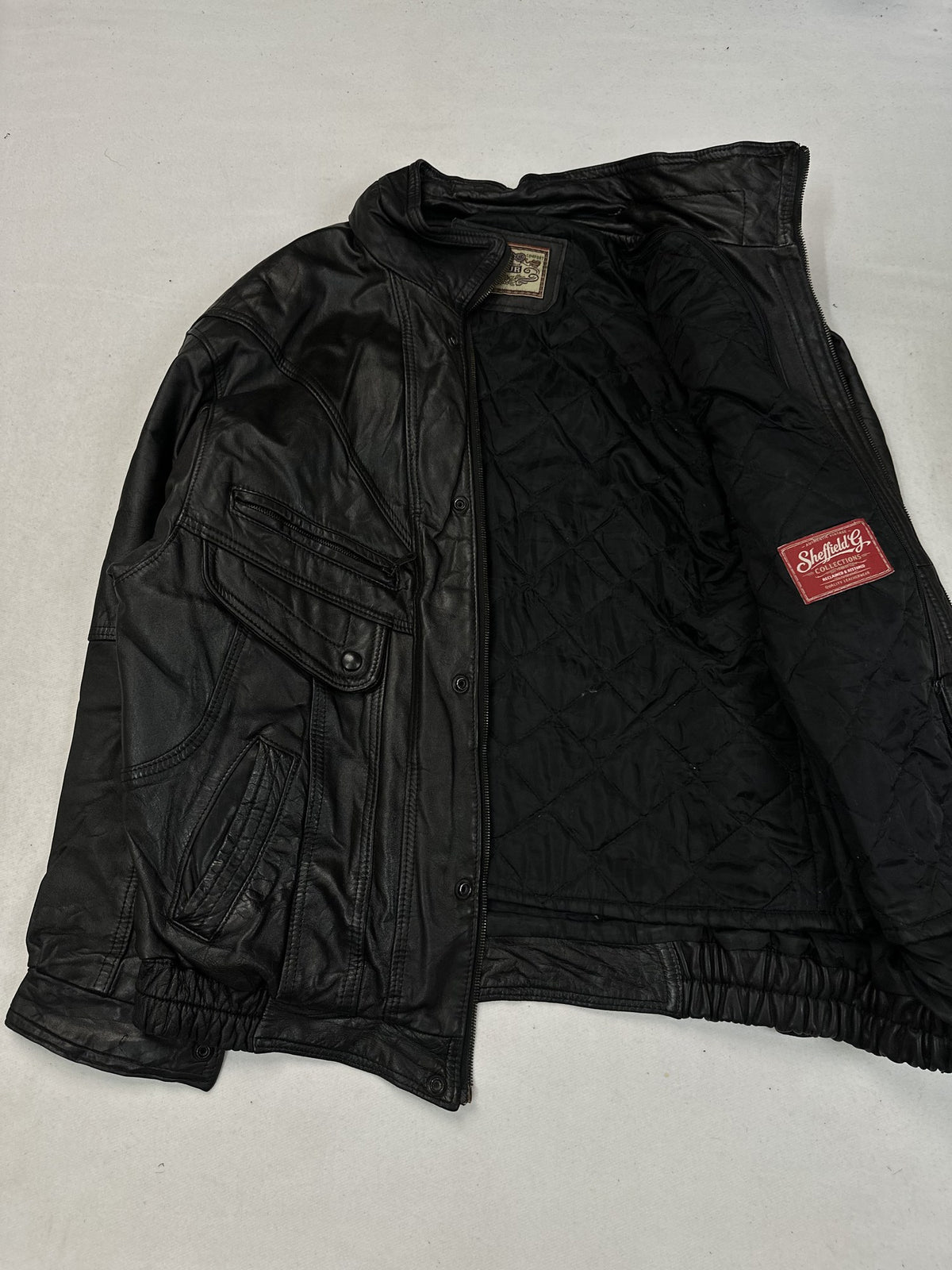 Black leather field jacket, size L - sleeve and cuff.