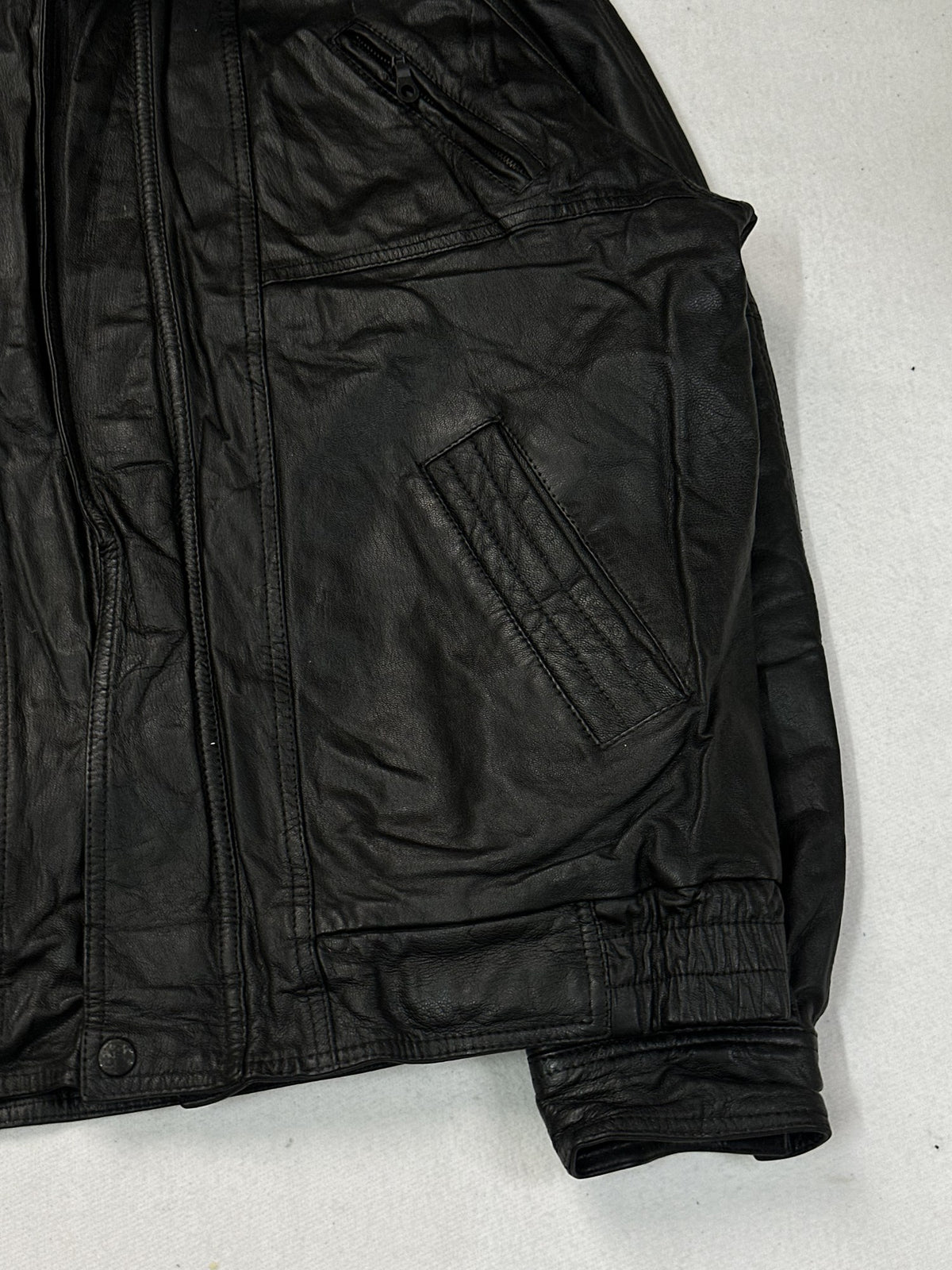 Black leather vintage jacket, size L - size and label context.