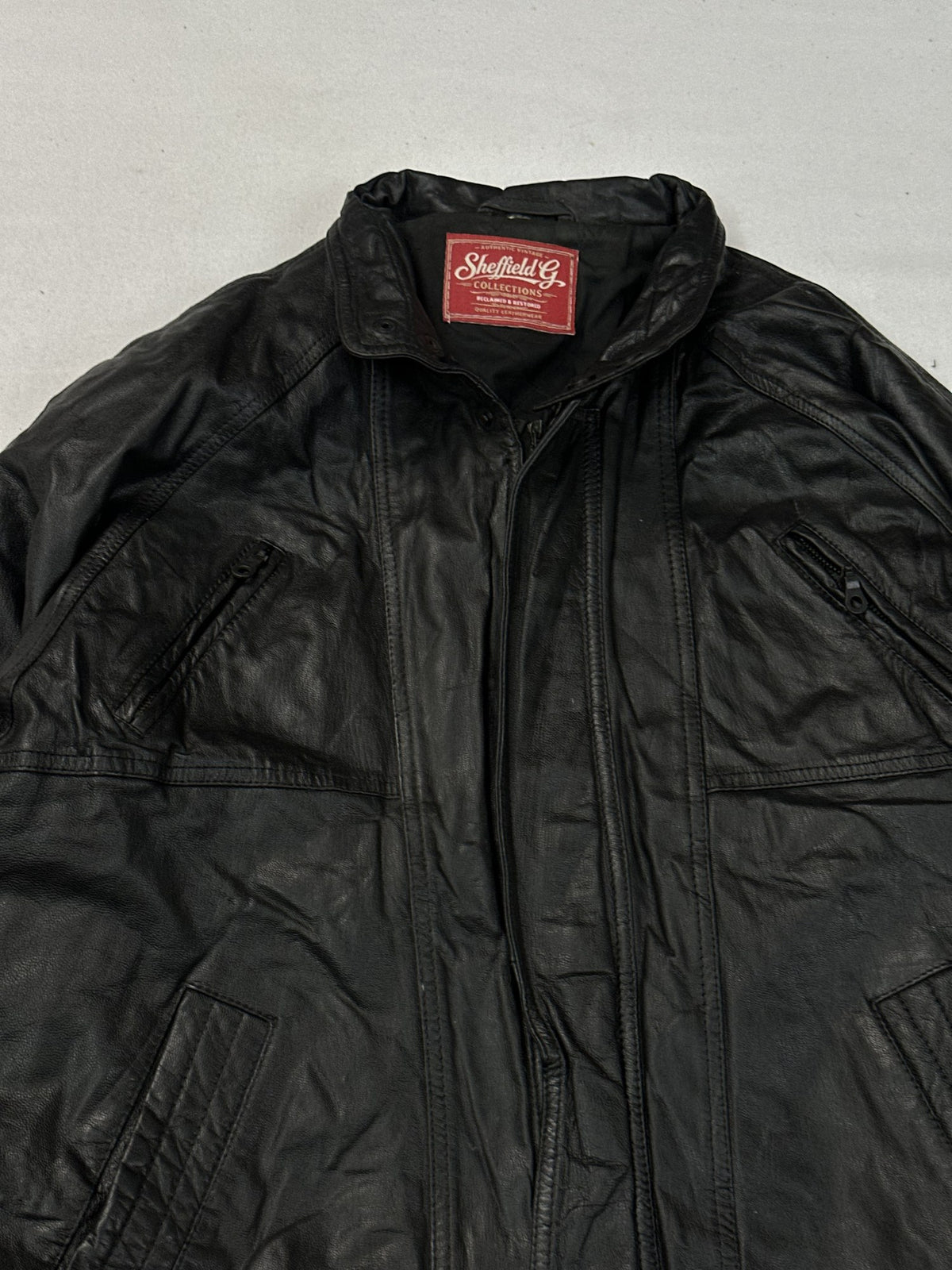 Black leather vintage jacket, size L - back view.