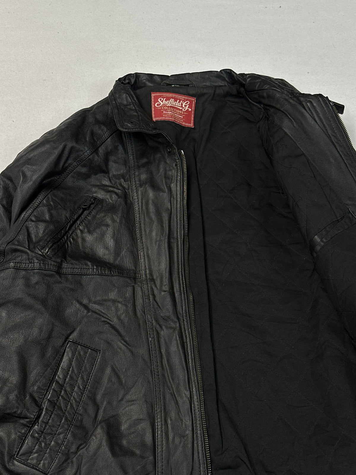 Black leather vintage jacket, size L - interior lining.