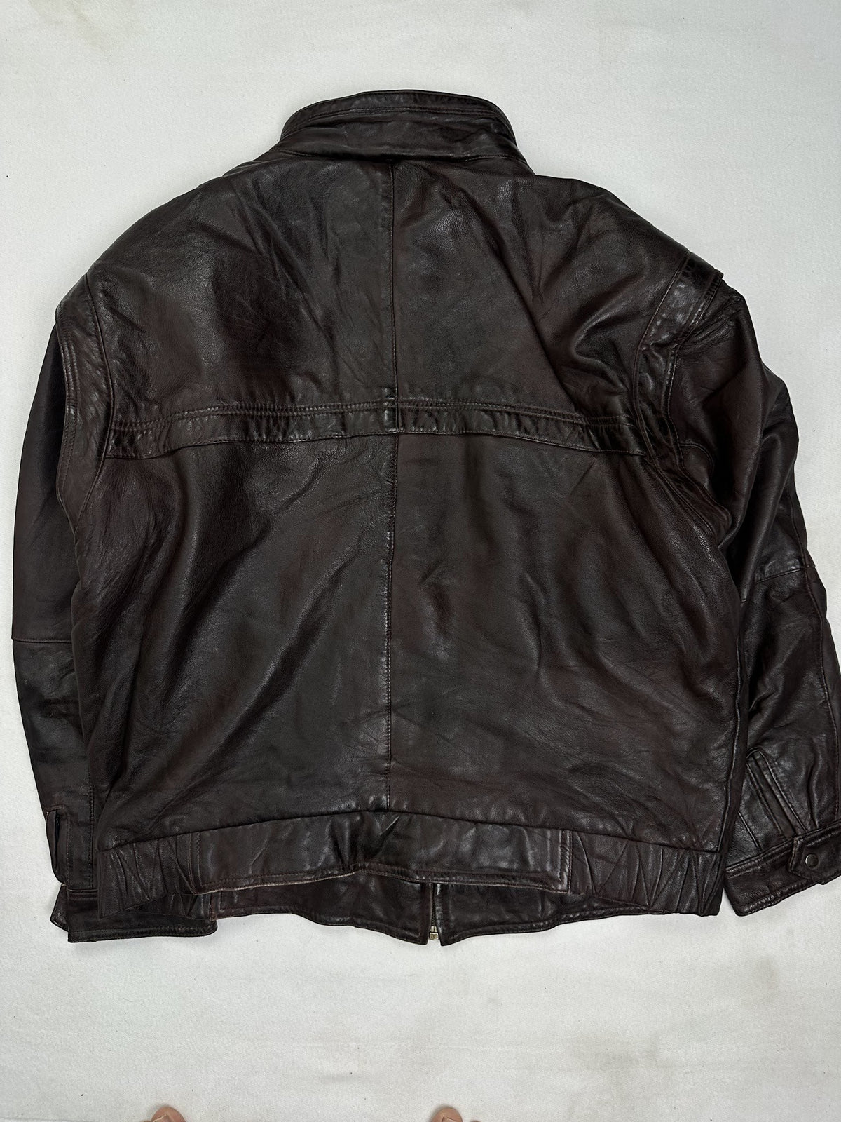 Back of the size L burgundy leather flight jacket, laid flat
