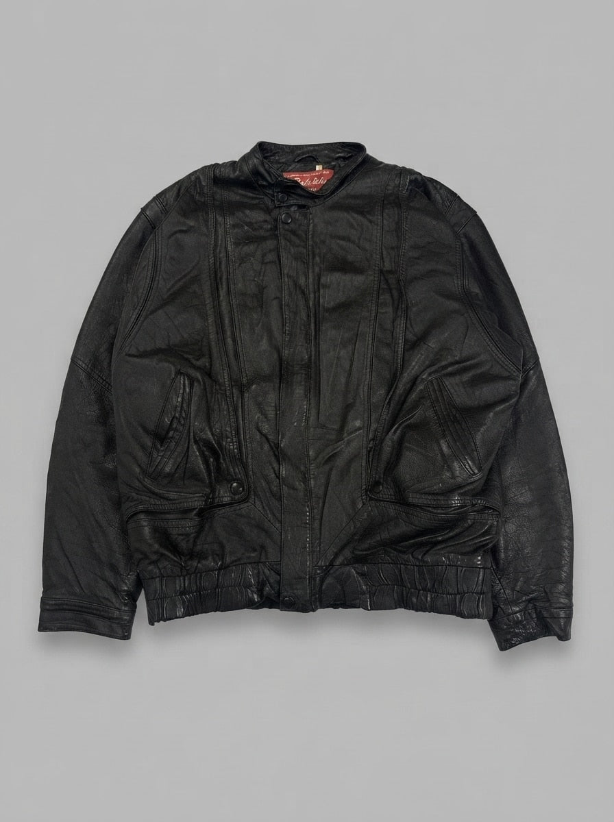 Black leather vintage jacket, size XL, shown flat from the front. 80s snap-front blouson.