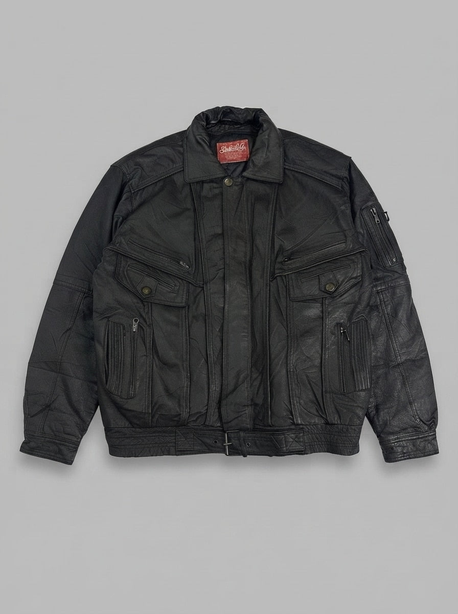 Black leather vintage jacket, size XXL, shown flat from the front. Buckle hem six-pocket.