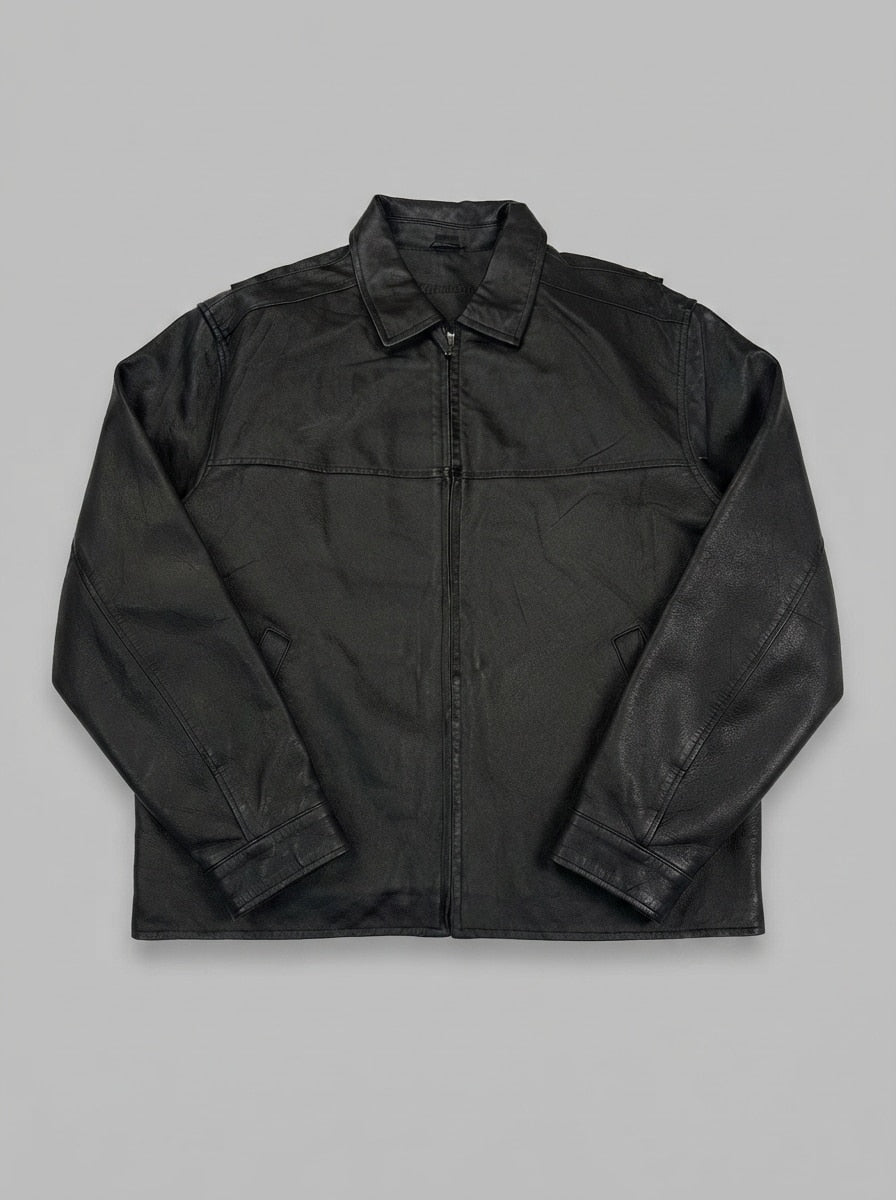 Black leather vintage jacket, size L, shown flat from the front. Chest yoke seam detail.