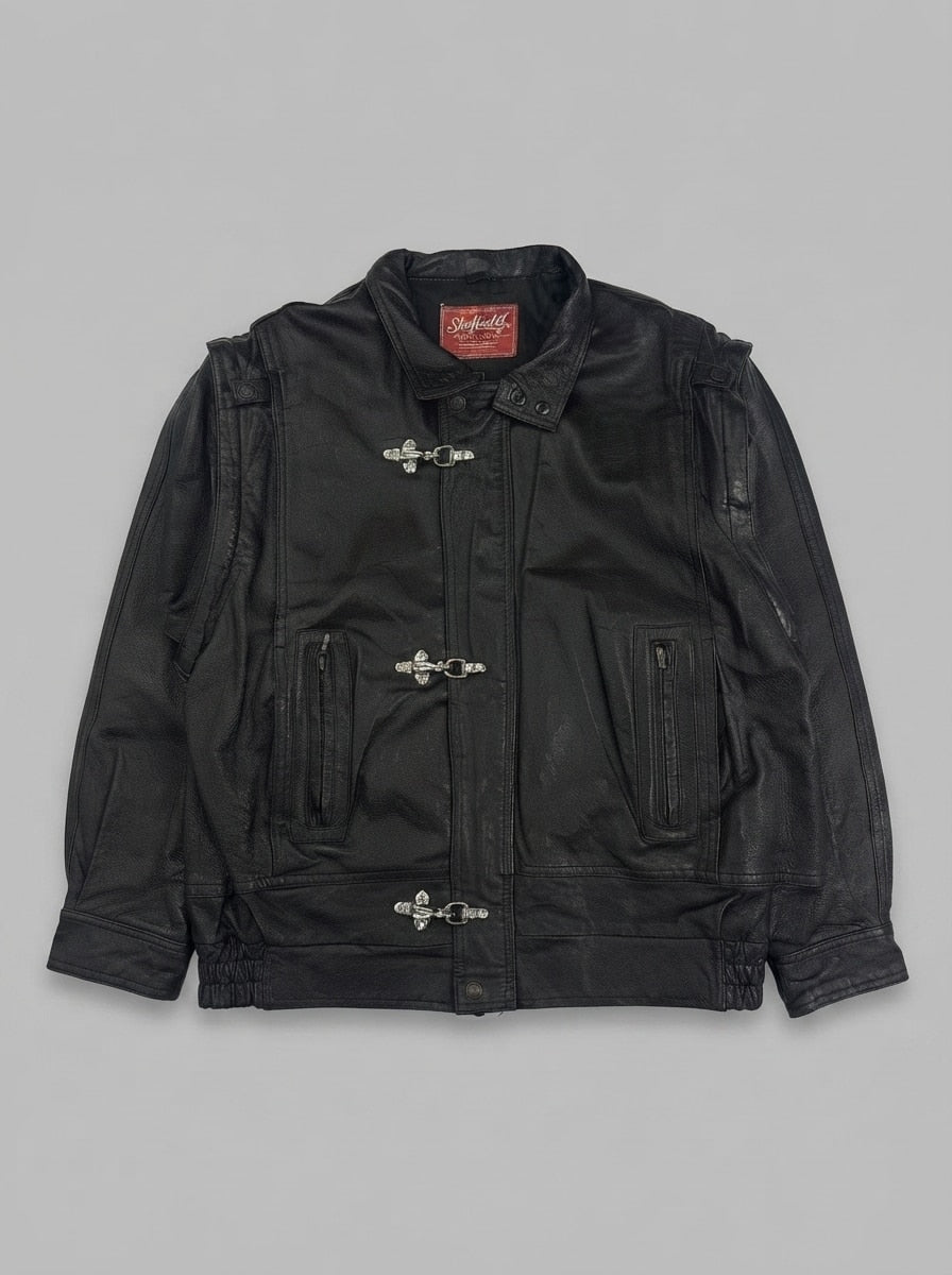 Black leather vintage jacket, size XL, shown flat from the front. Epaulettes and stand collar.