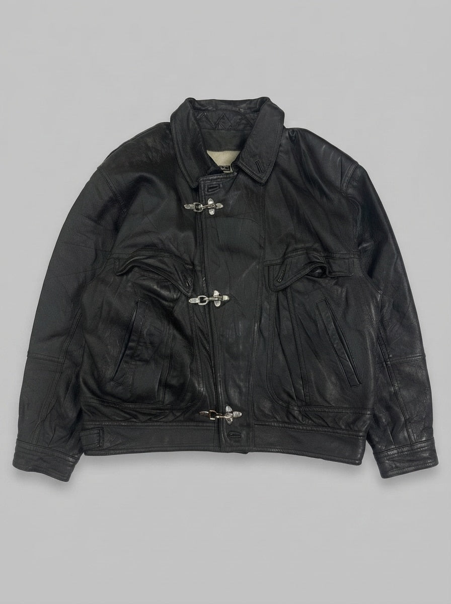 Black leather vintage jacket, size XXL, shown flat from the front. Quilted moto panels.