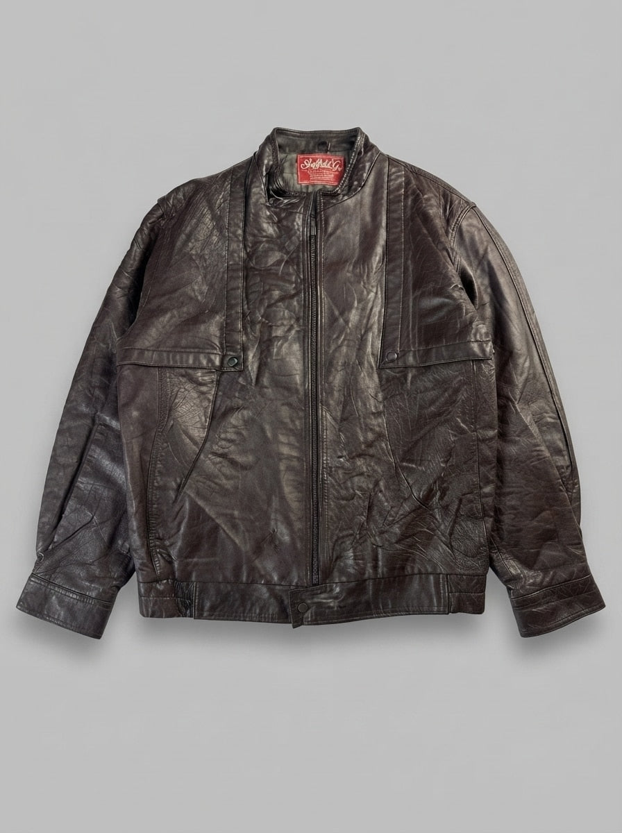 Brown leather cafe racer jacket, size XL, shown flat from the front. Snap-tab waistband.