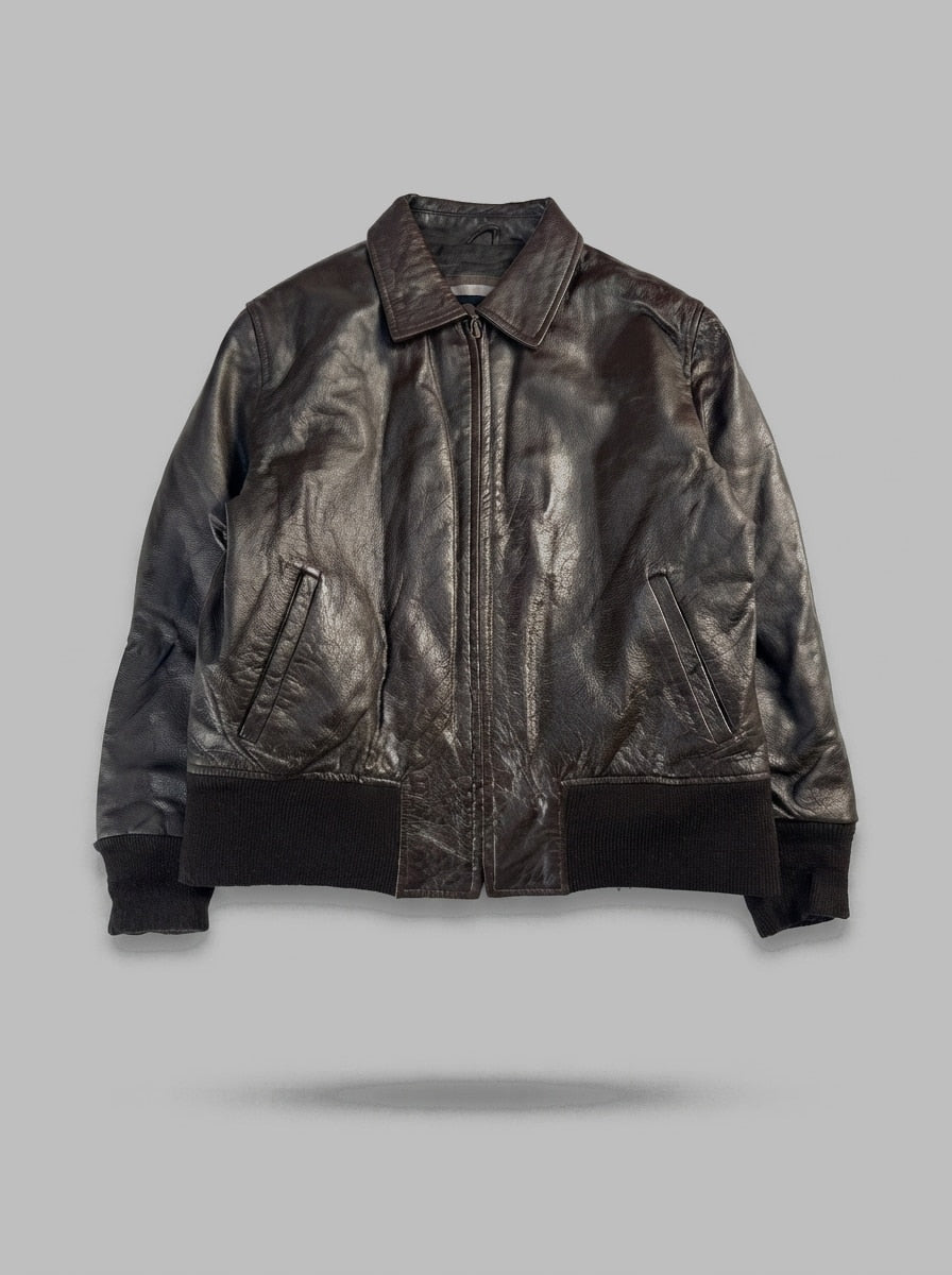 Brown leather flight jacket, size M, shown flat from the front. Compact blouson cut.