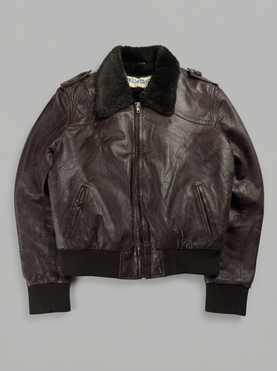 Brown leather flight jacket, size M, shown flat from the front. Fur collar.