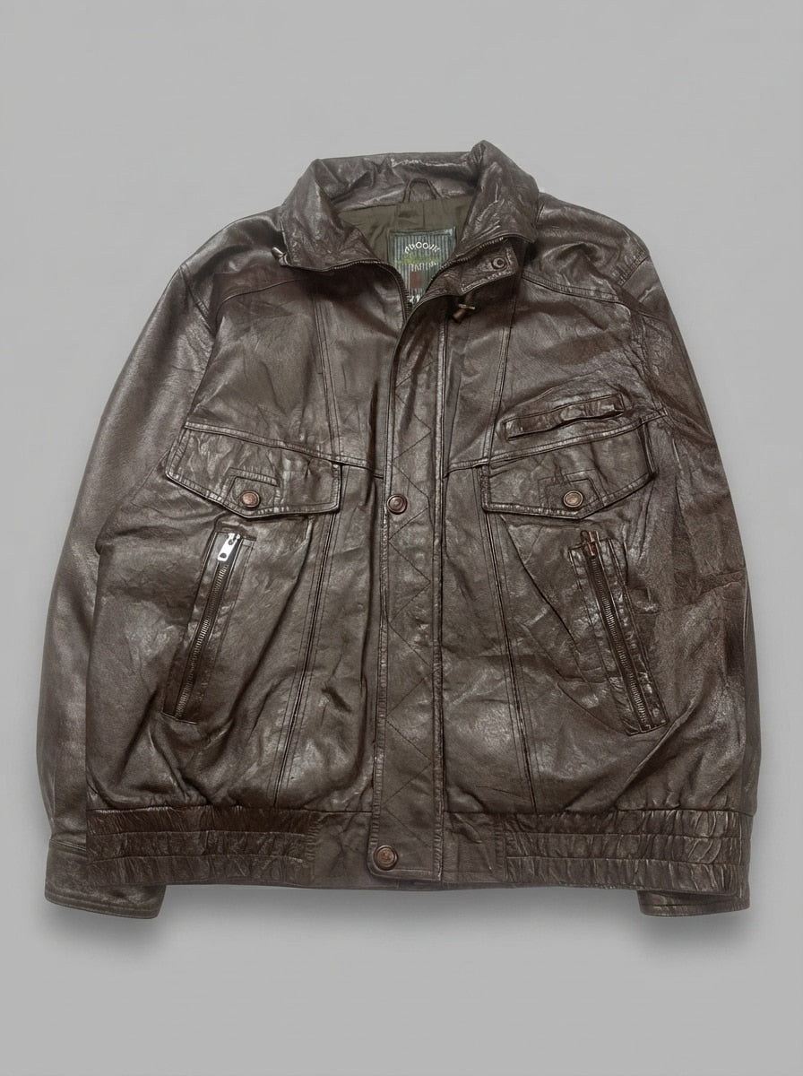 Brown leather trucker jacket, size XL, shown flat from the front. Chest pockets.