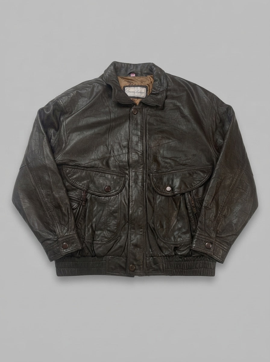 Brown leather vintage jacket, size XXL, shown flat from the front. Bellows flap pockets.