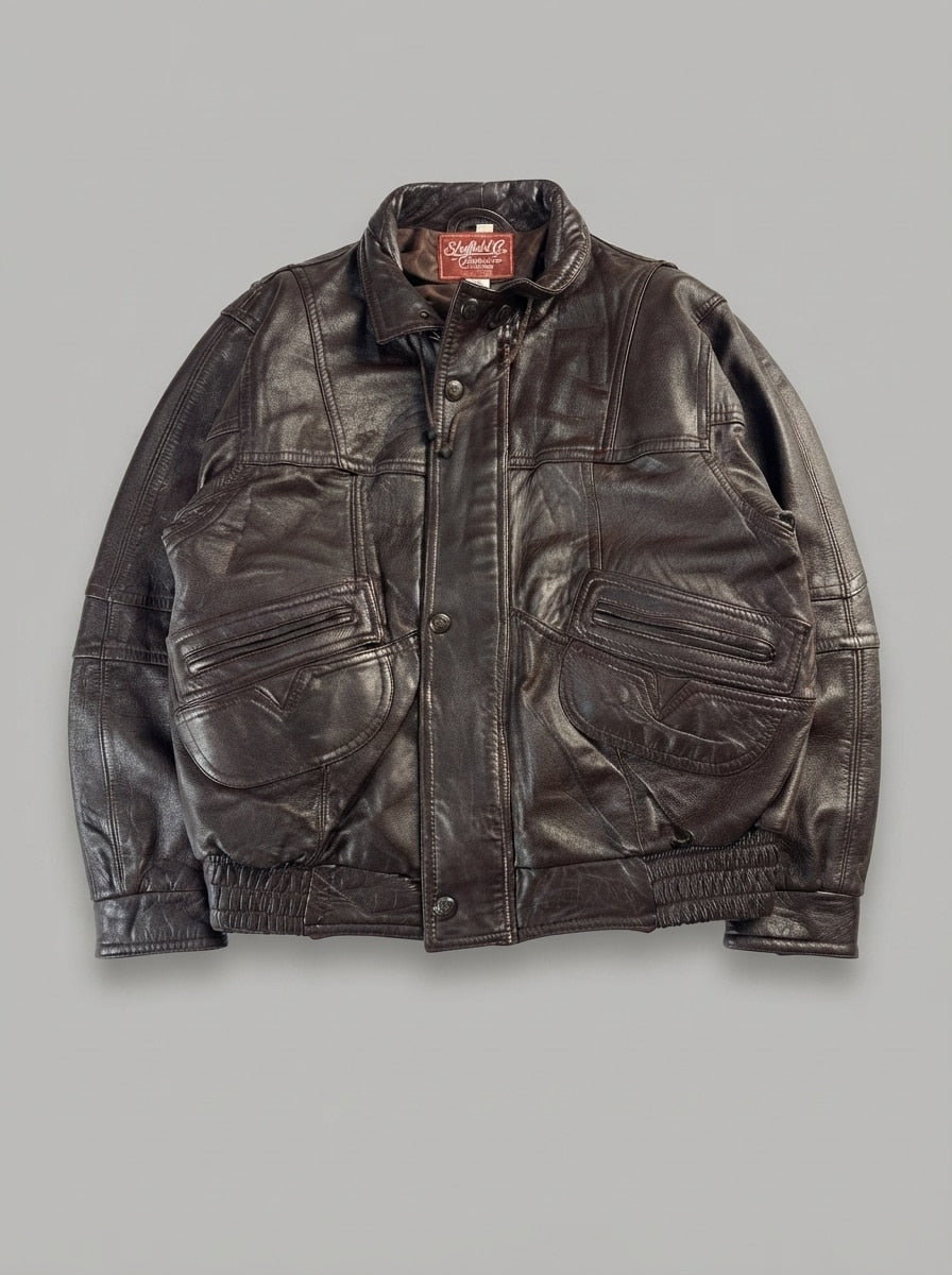 Brown leather vintage jacket, size L, shown flat from the front. Diamond-stitch pockets.