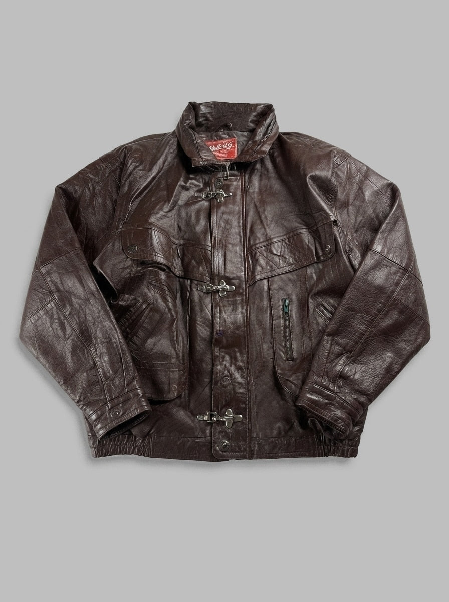 Brown leather vintage jacket, size XL, shown flat from the front. Embossed leather.