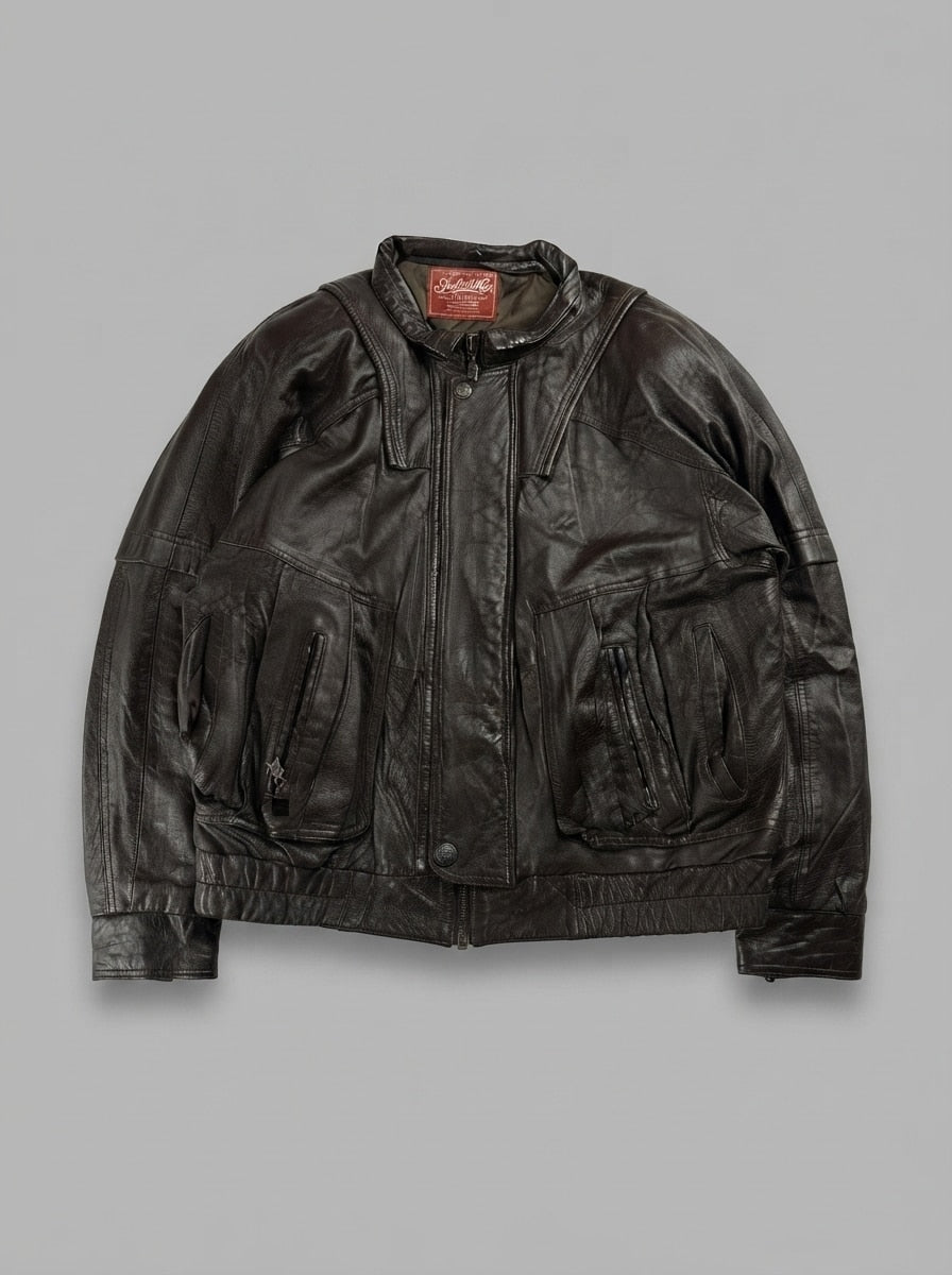 Brown leather vintage jacket, size XL, shown flat from the front. Multi-pocket front.
