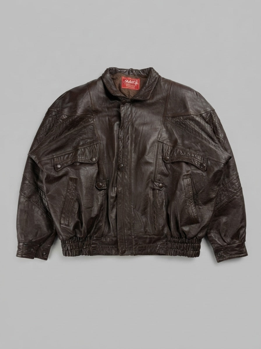 Brown leather vintage jacket, size XXL, shown flat from the front. Snap chest pockets.