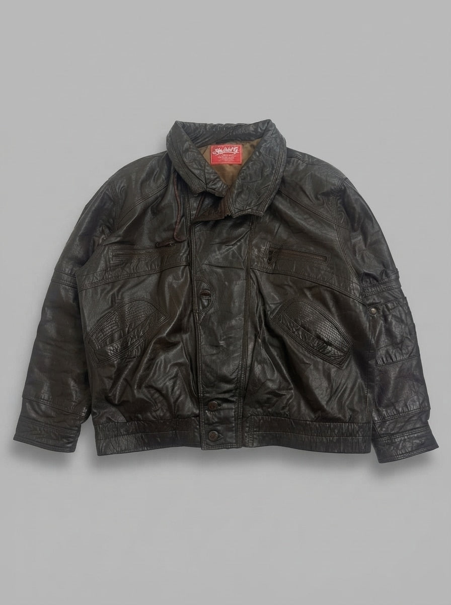 Brown leather vintage jacket, size XL, shown flat from the front. Teardrop stitched pocket panels.