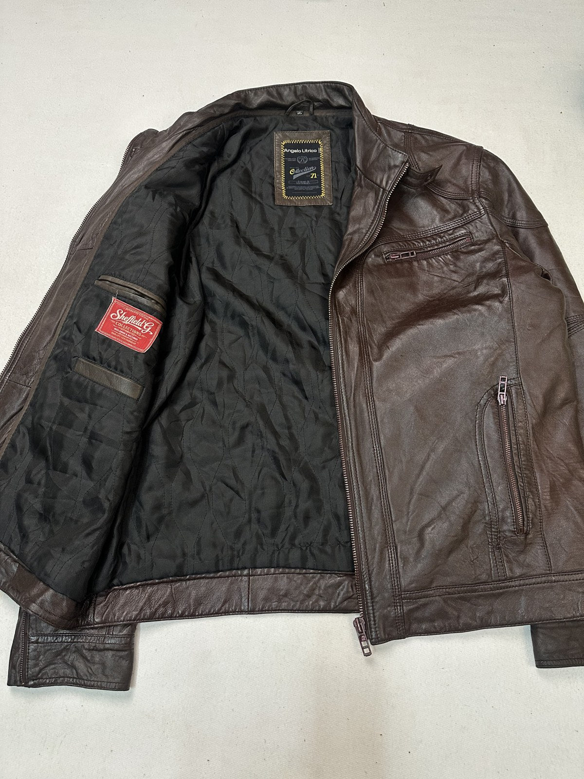 Lining shown inside the cafe racer burgundy leather biker jacket